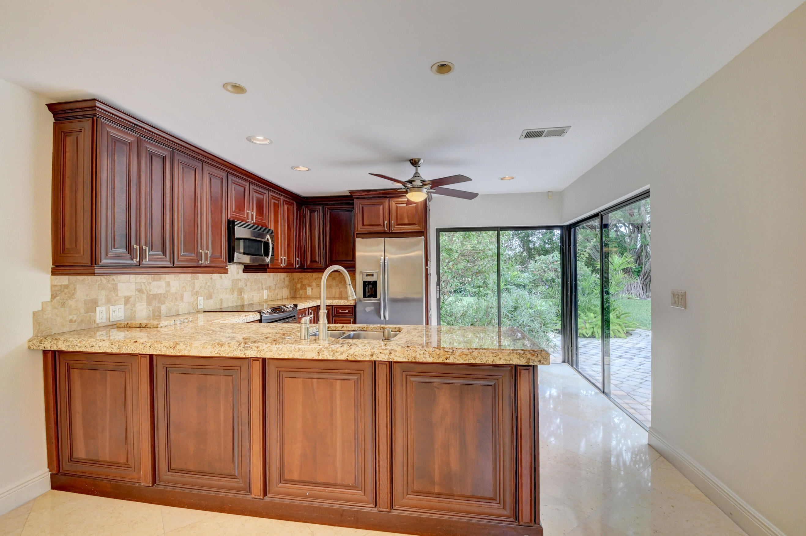 4535 Cocoplum Way Delray Beach, FL 33445 - Photo 19 of 50 Kitchen area