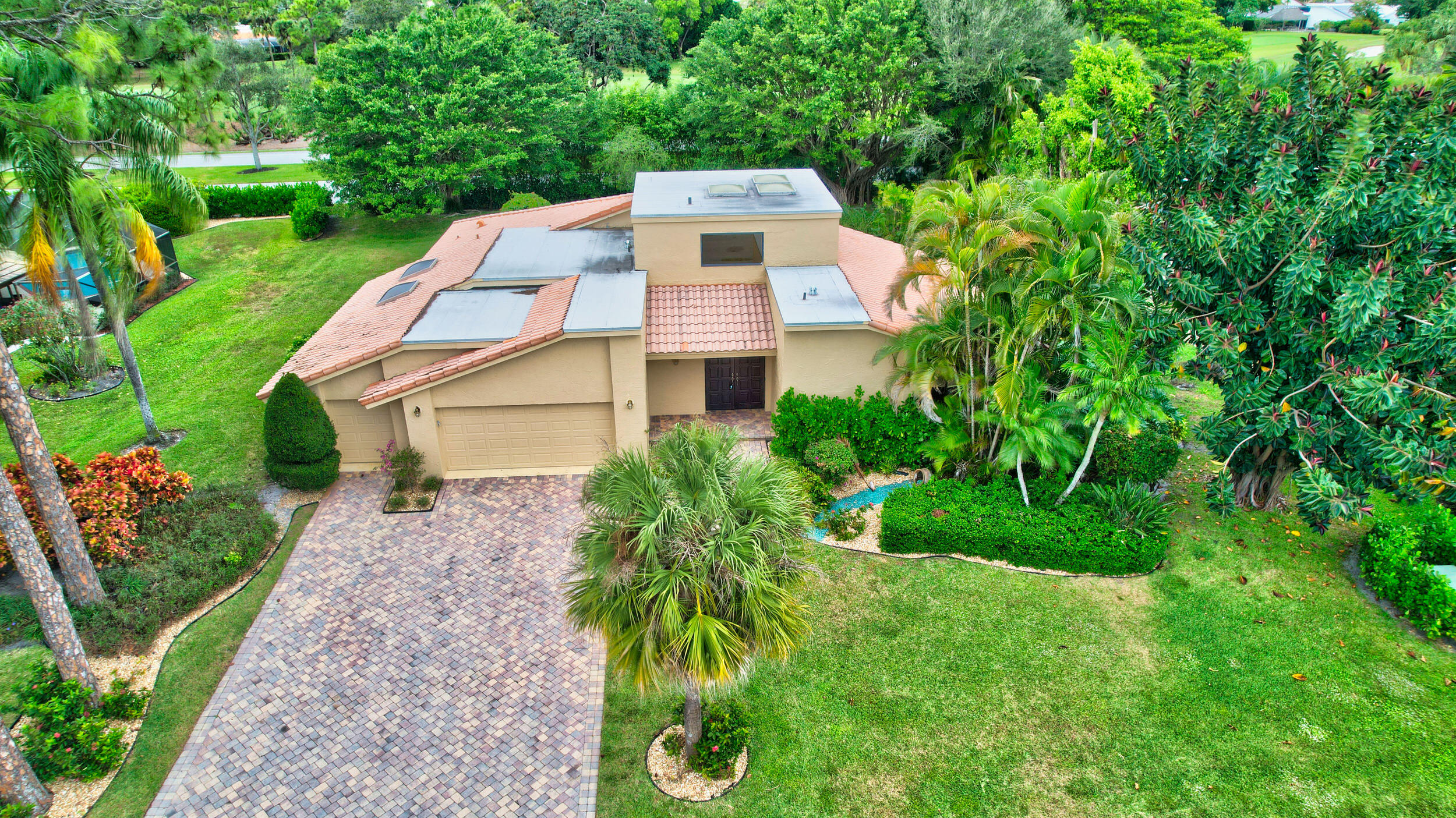 4535 Cocoplum Way Delray Beach, FL 33445 - Photo 4 of 50 Flat roofs are newer