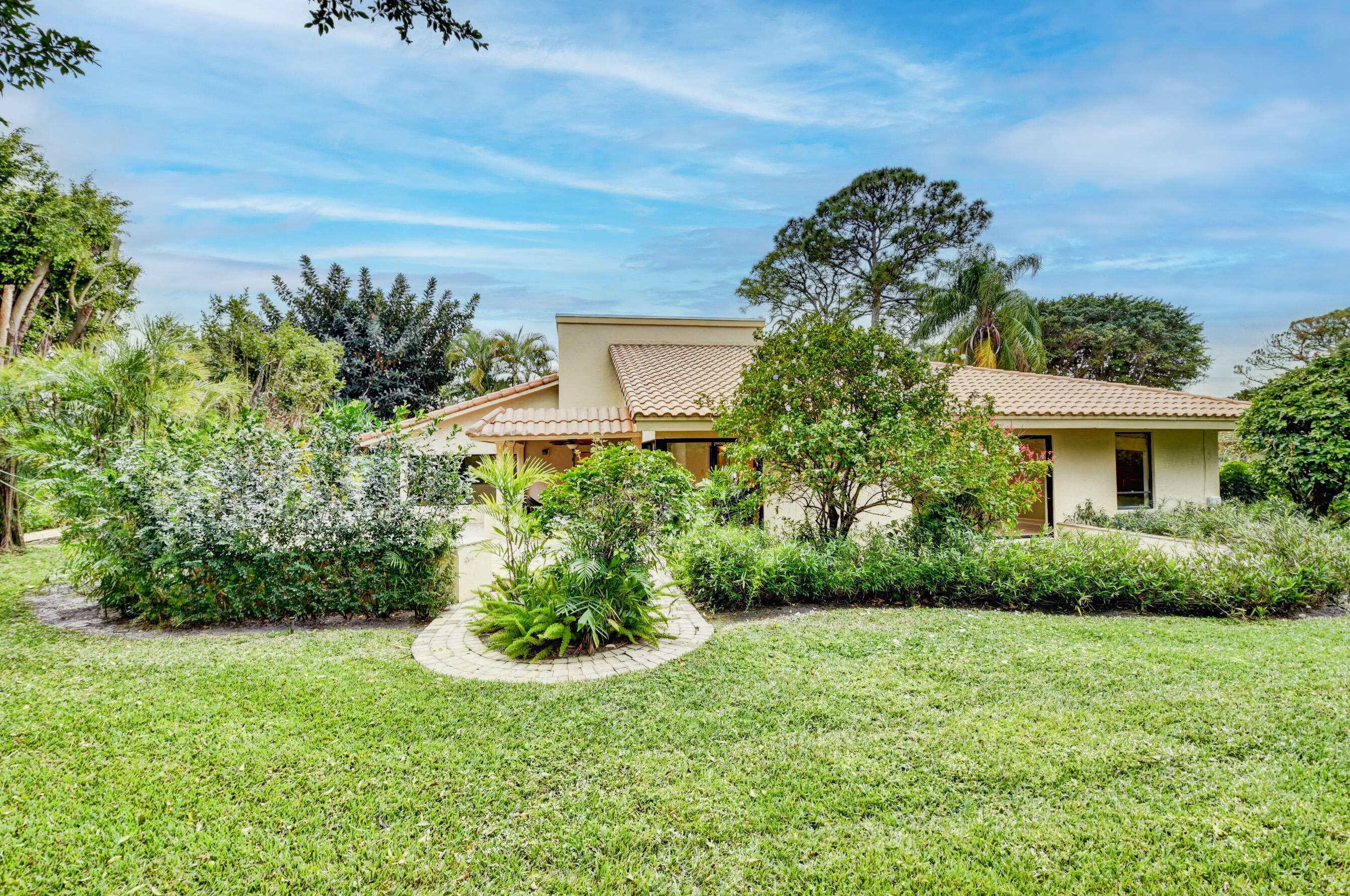 4535 Cocoplum Way Delray Beach, FL 33445 - Photo 48 of 50 Rear view of home