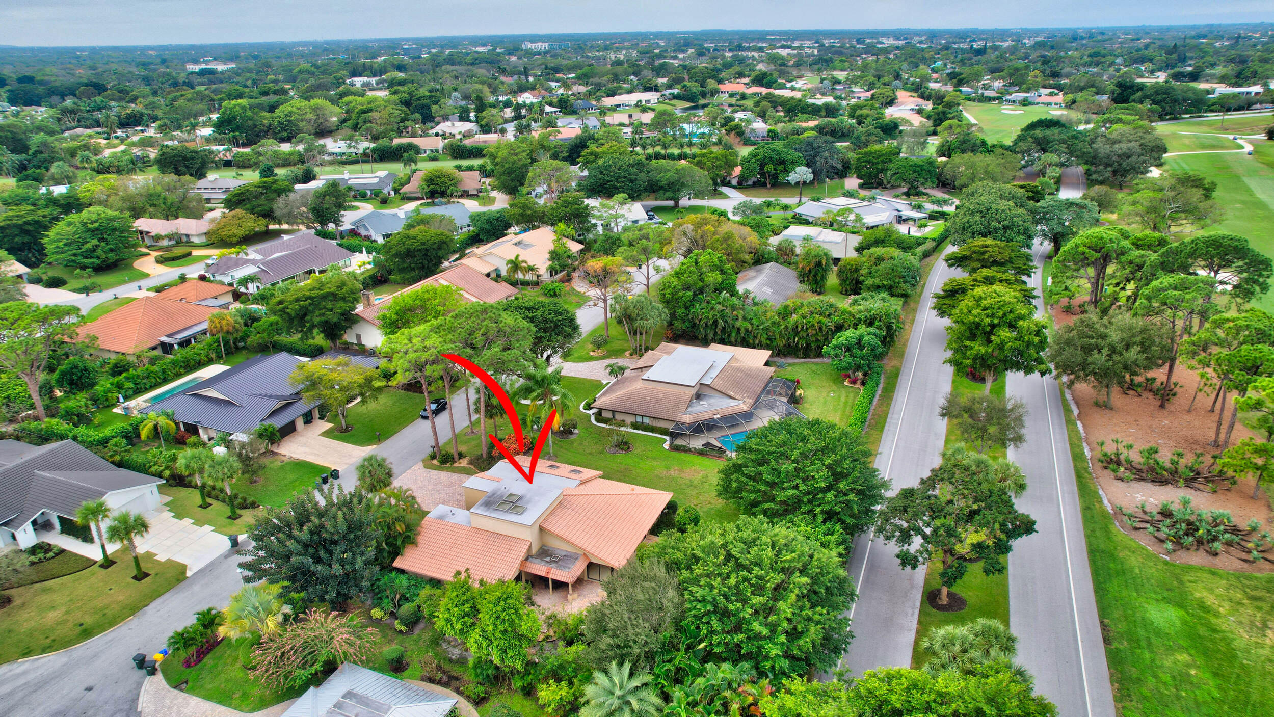 4535 Cocoplum Way Delray Beach, FL 33445 - Photo 8 of 50 Hamlet Drive runs behind home
