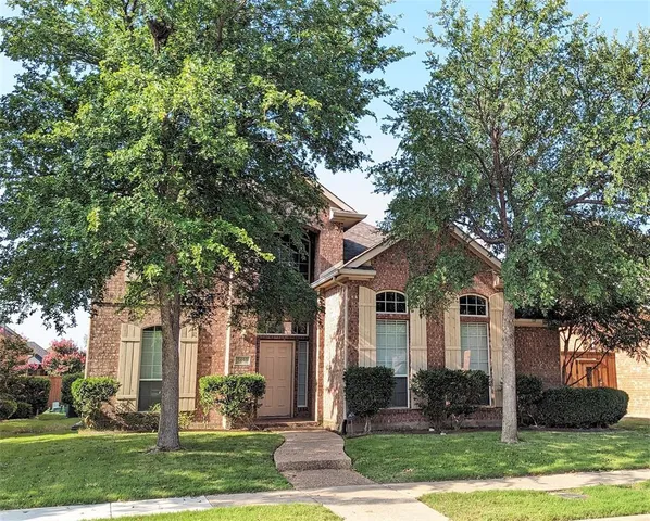 front view of house with a yard