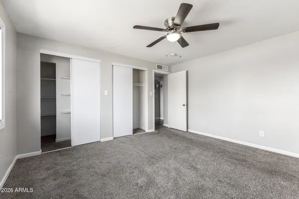 a view of a livingroom with a ceiling fan