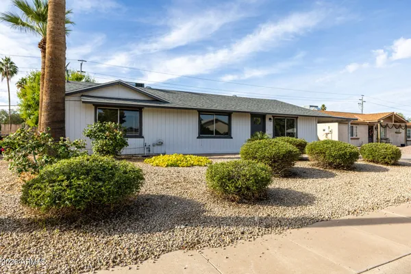 a view of a house with a patio