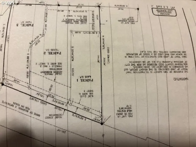 a view of a bathroom with mirror