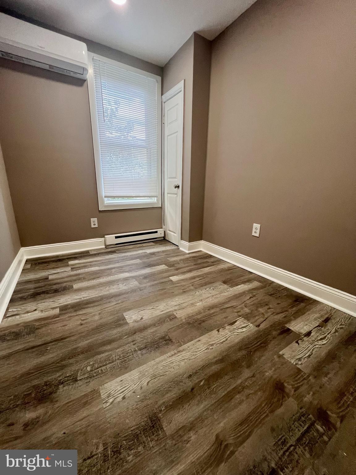 2610 Sylmar Street Philadelphia, PA 19142 - Photo 16 of 19 a view of a room with wooden floor