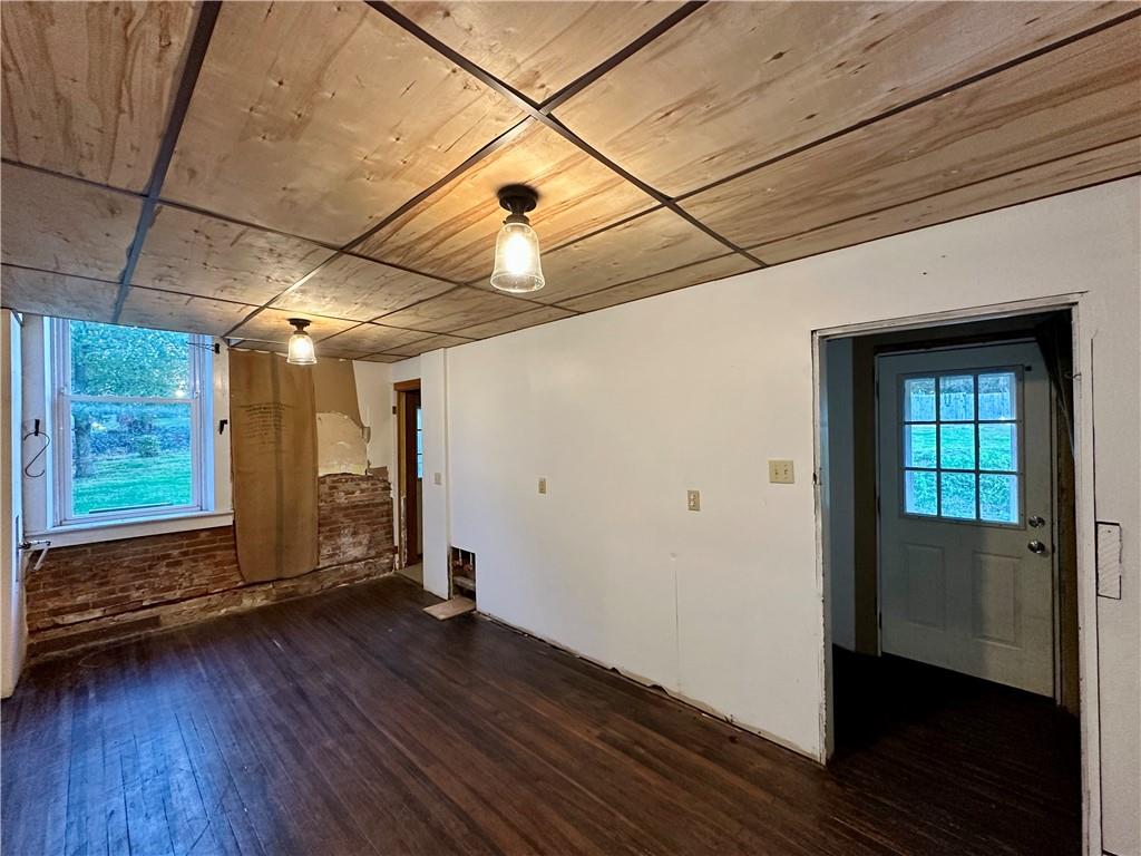 118 Firehall Road Portersville, PA 16051 - Photo 7 of 29 a view of empty room with wooden floor and fan