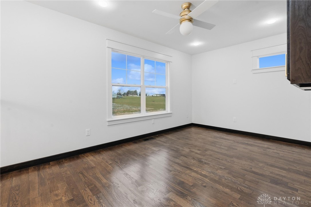 3509 South State Rte 72 Sabina, OH 45169 - Photo 23 of 44 This airy living space offers ample natural light and beautiful wood flooring.