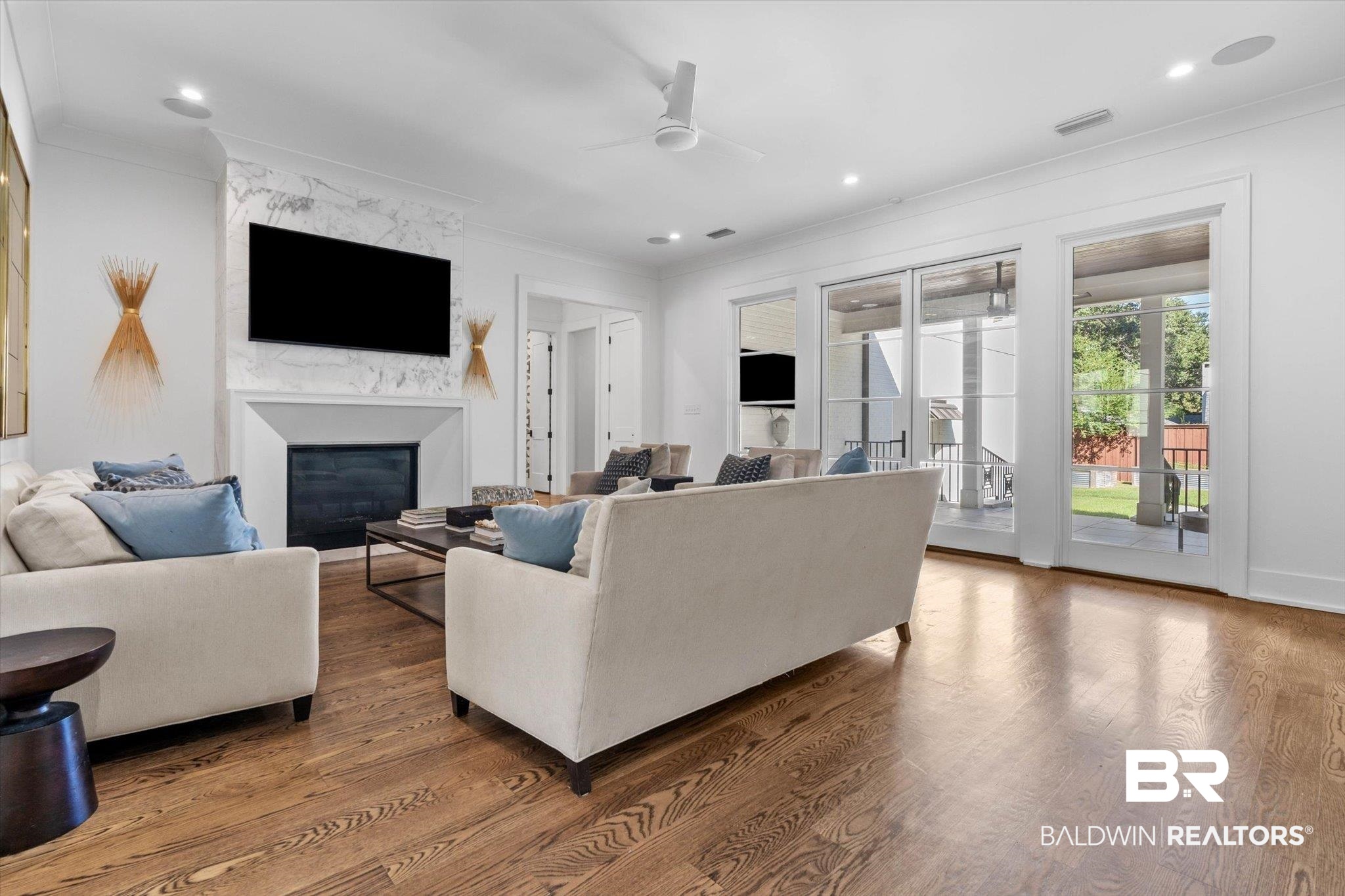 4602 Kingswood Drive Mobile, AL 36608 - Photo 6 of 45 Living room featuring wood finished floors, ornamental molding, a fireplace, ceiling fan, and recessed lighting