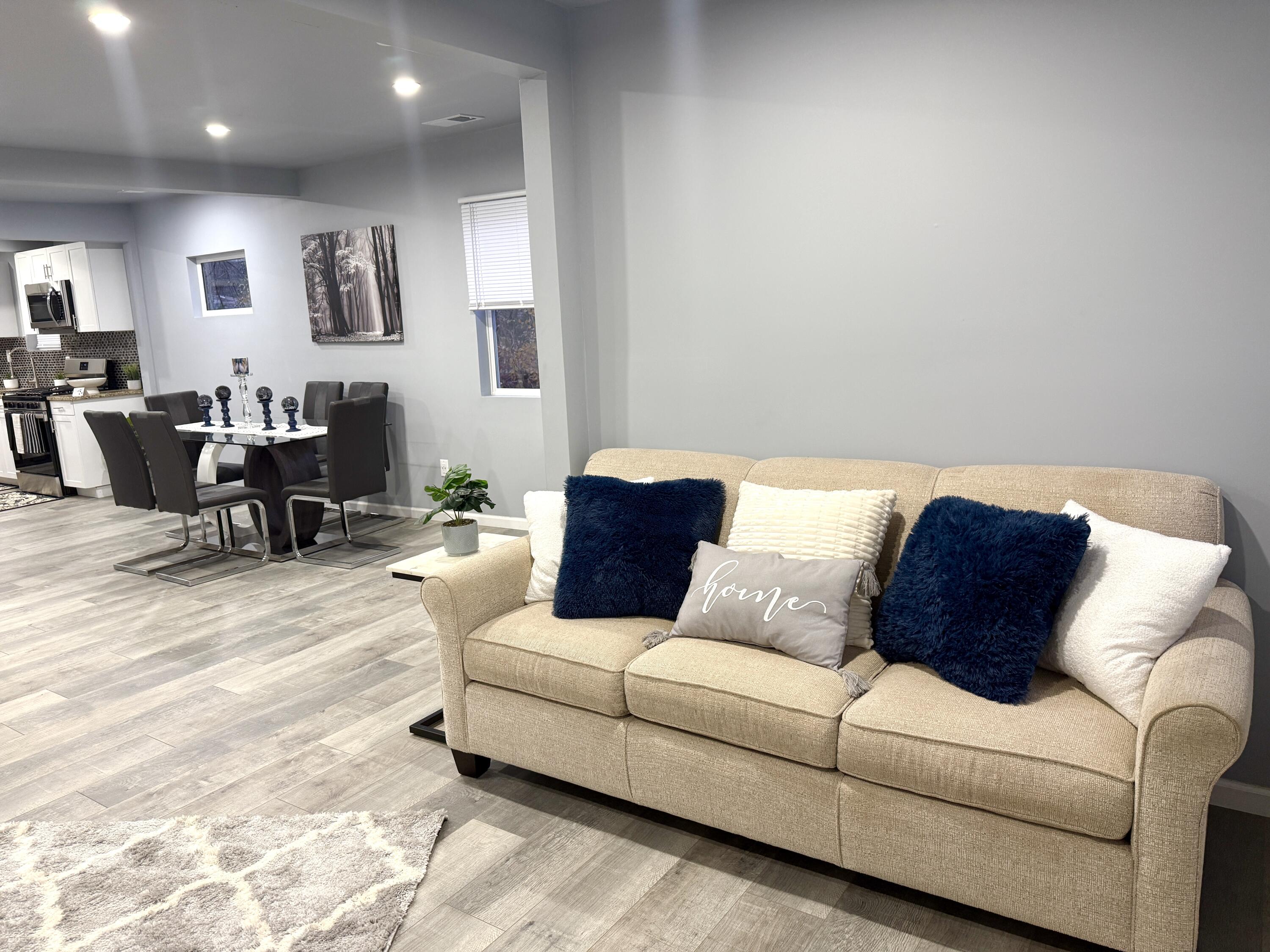 6344 West 25th Avenue Gary, IN 46406 - Photo 12 of 52 a living room with furniture and a large window