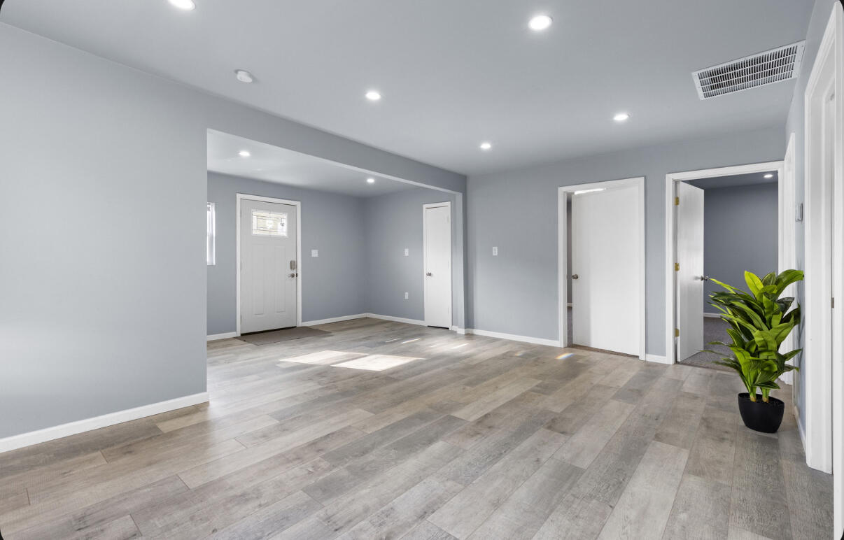 6344 West 25th Avenue Gary, IN 46406 - Photo 23 of 52 a view of empty room with wooden floor