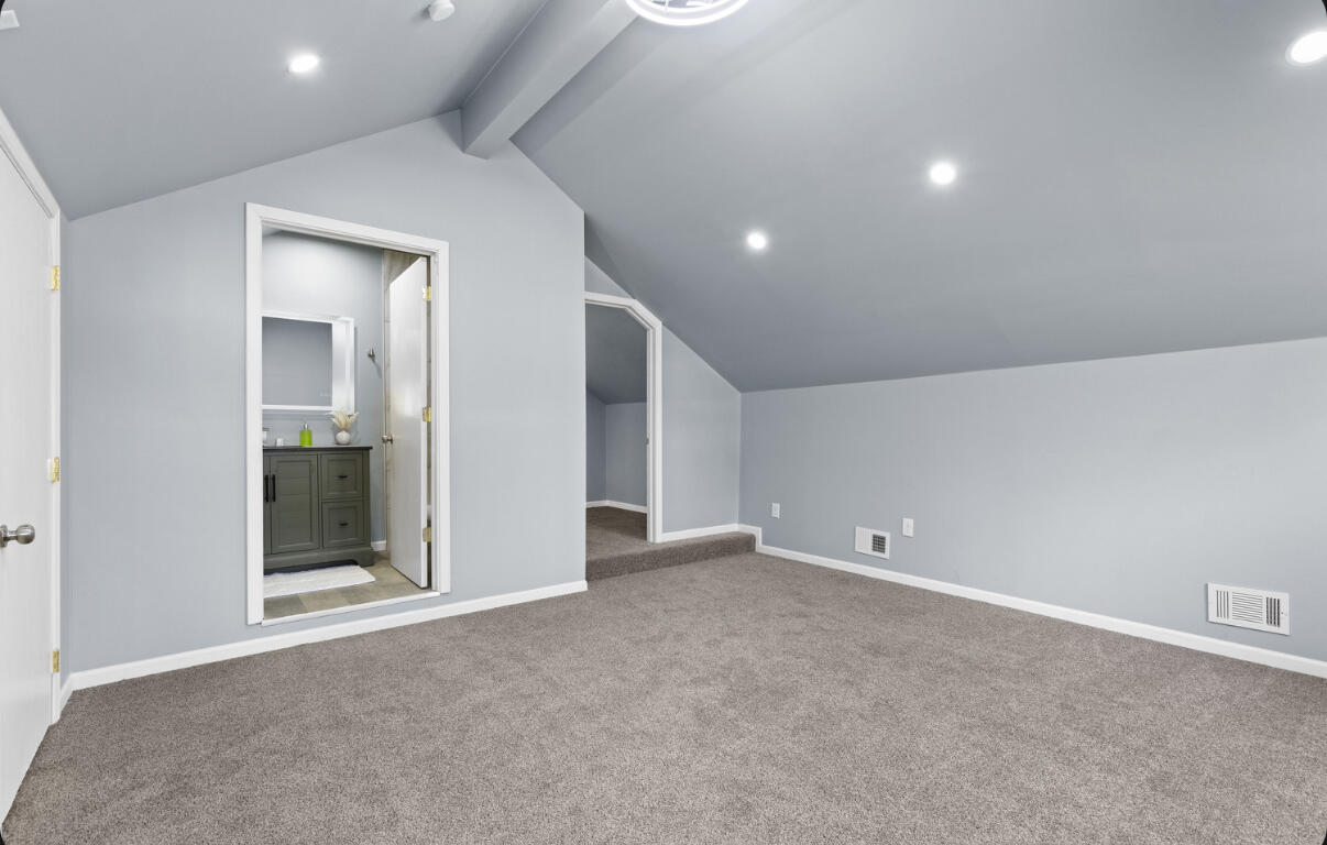 6344 West 25th Avenue Gary, IN 46406 - Photo 35 of 52 an empty room with closet and mirror