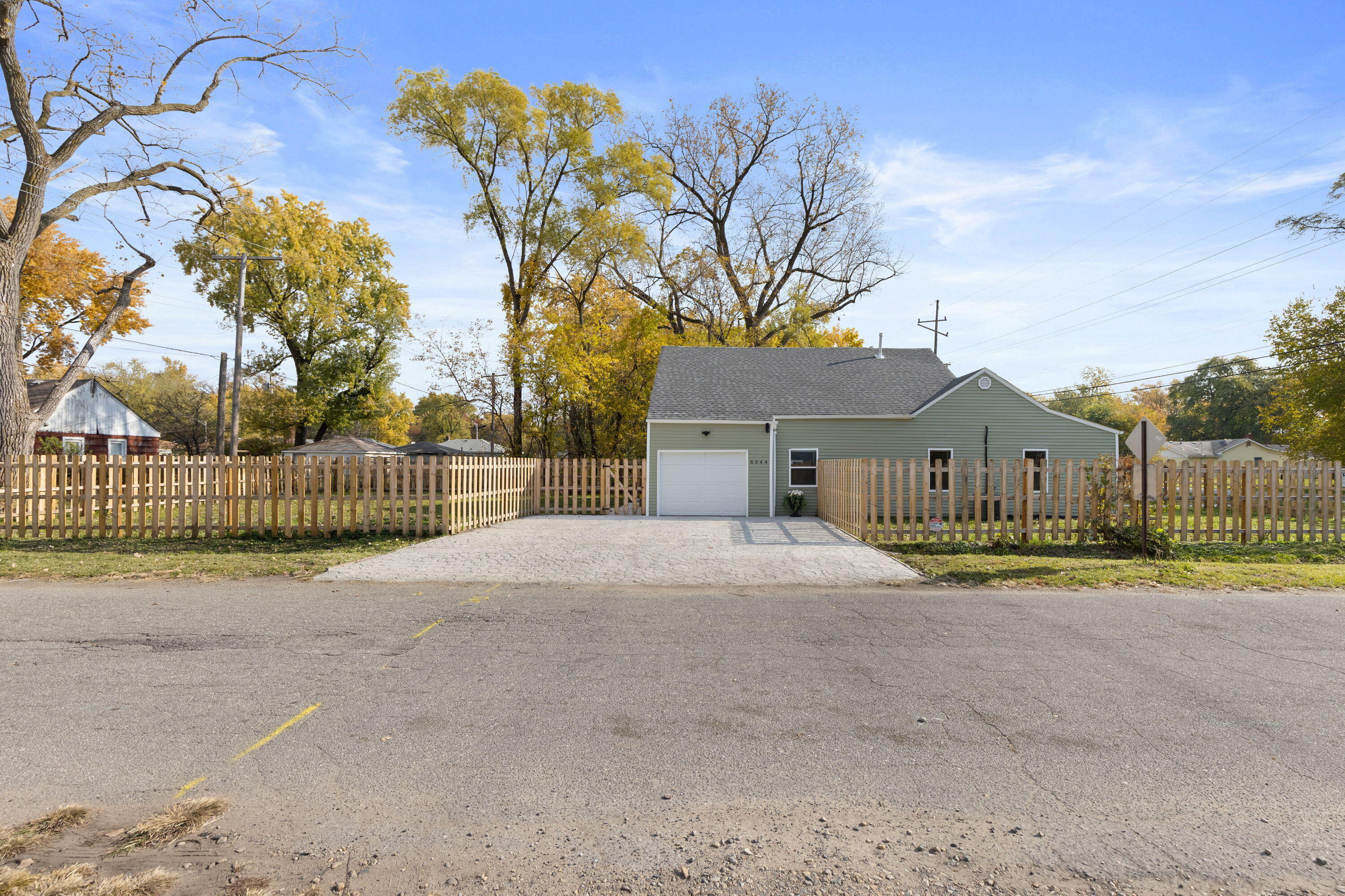 6344 West 25th Avenue Gary, IN 46406 - Photo 4 of 52 a view of road and fence