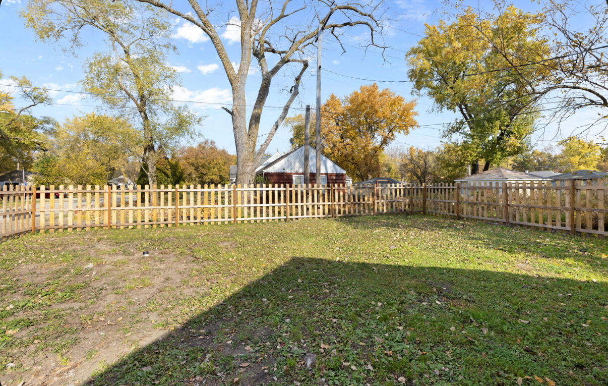6344 West 25th Avenue Gary, IN 46406 - Photo 43 of 52 a view of a yard with wooden fence