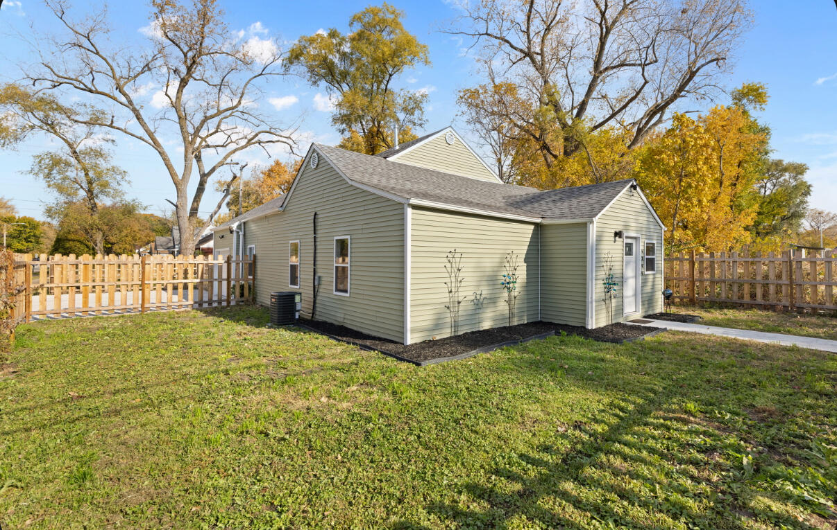 6344 West 25th Avenue Gary, IN 46406 - Photo 5 of 52 a view of a house with a yard