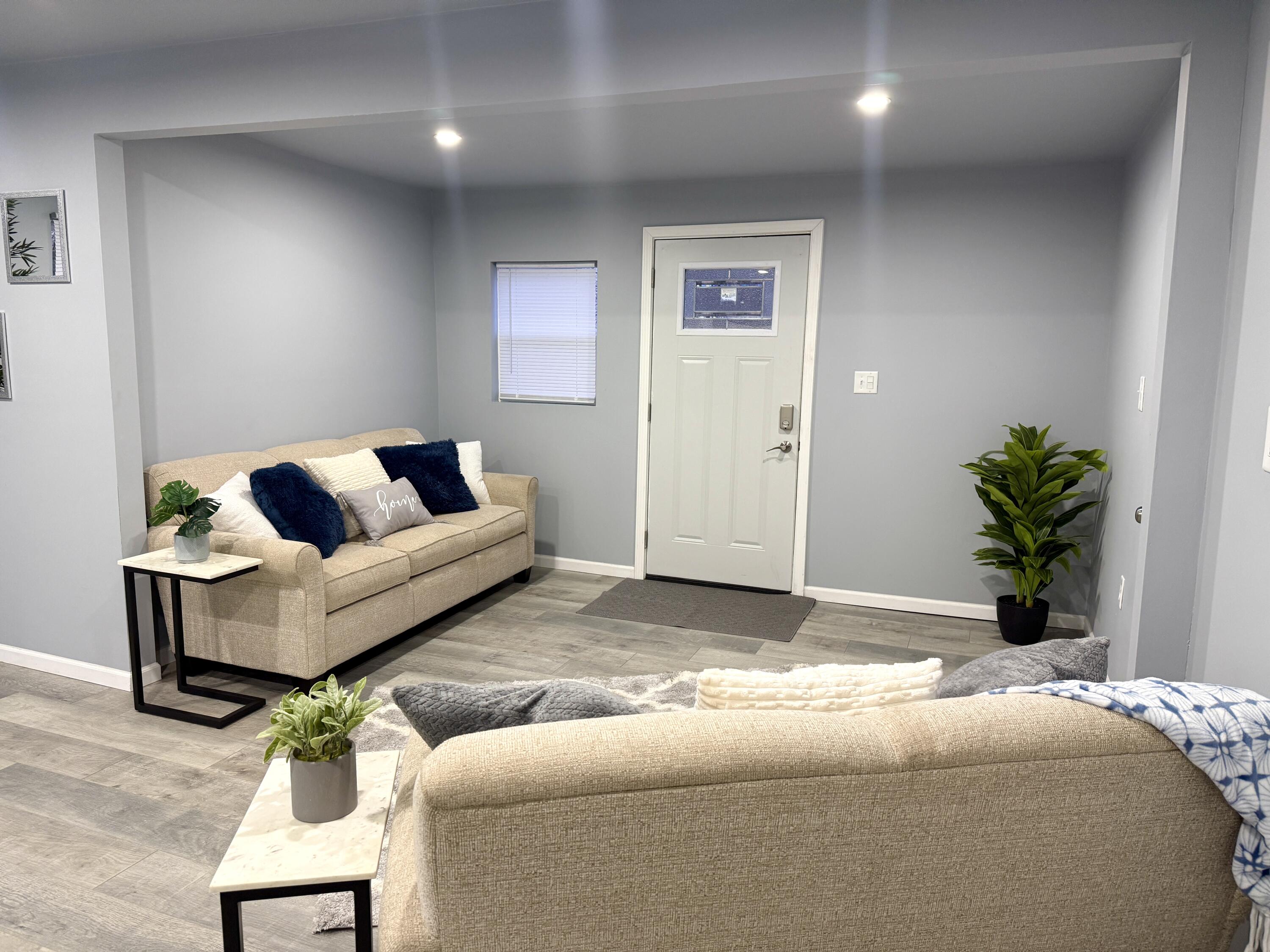 6344 West 25th Avenue Gary, IN 46406 - Photo 9 of 52 a living room with furniture and a potted plant