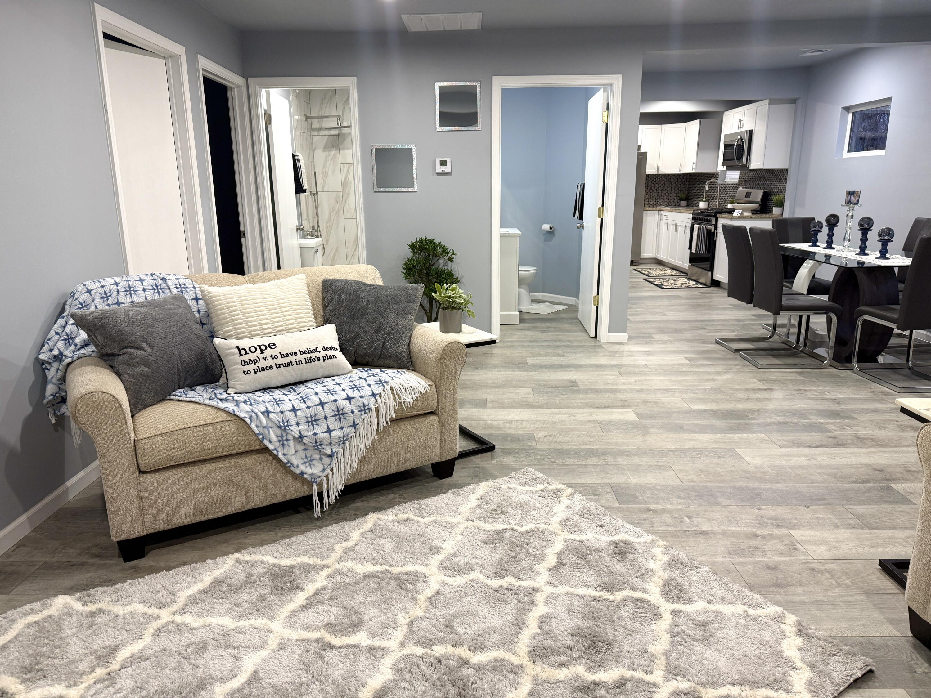 6344 West 25th Avenue Gary, IN 46406 - Photo 10 of 52 a living room with furniture and wooden floor