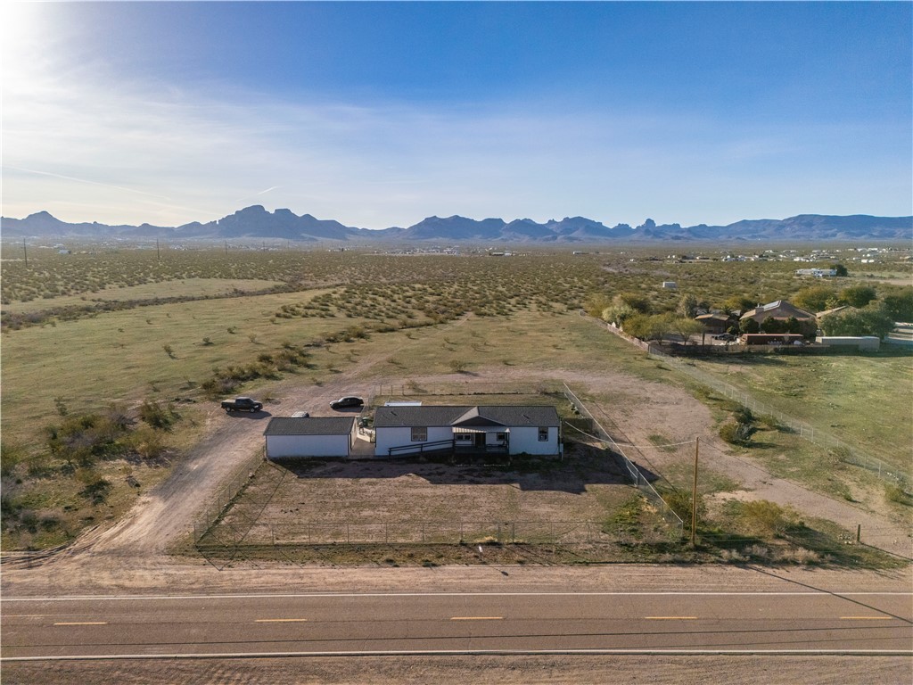 1071 South Estrella Road Golden Valley, AZ 86413 - Photo 1 of 50 a view of a lake with a mountain