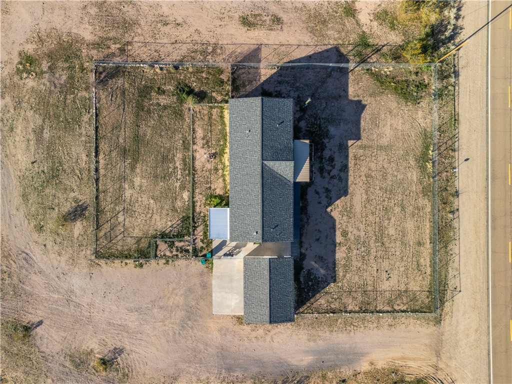 1071 South Estrella Road Golden Valley, AZ 86413 - Photo 49 of 50 a view of a brick house