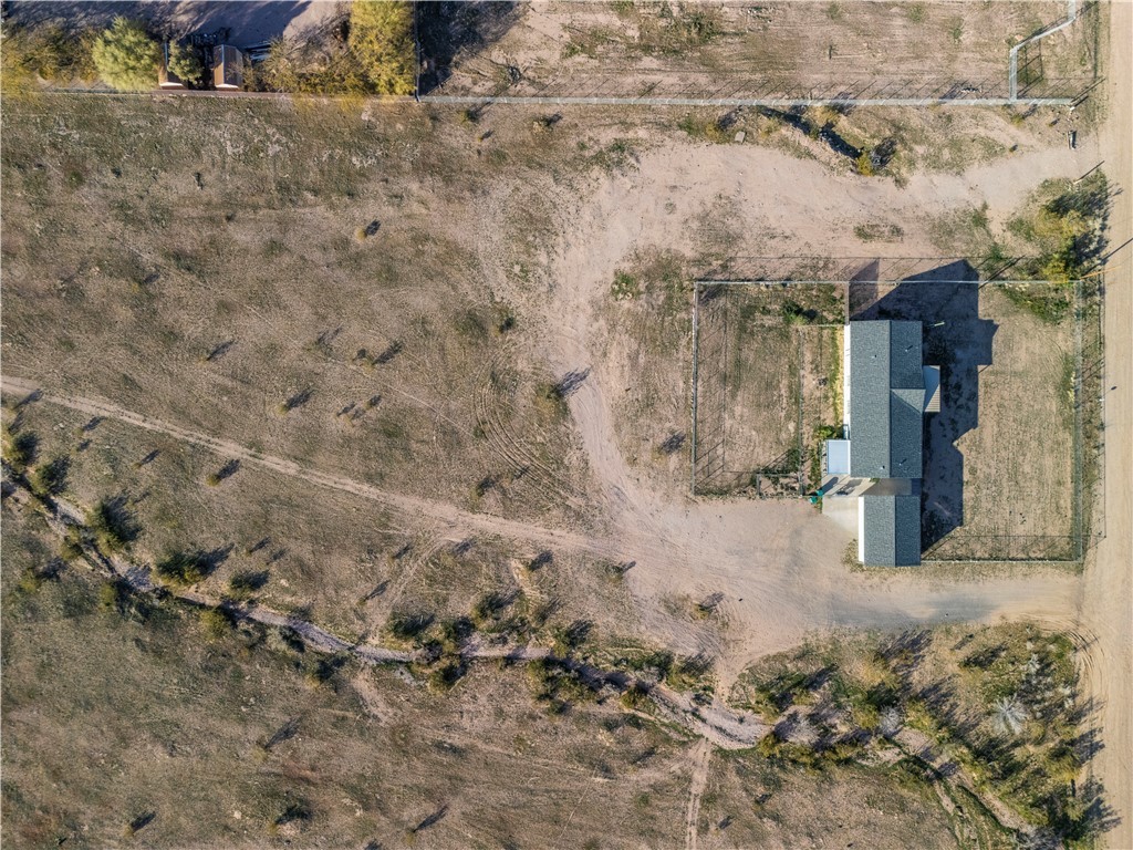 1071 South Estrella Road Golden Valley, AZ 86413 - Photo 50 of 50 a view of a yard with trees