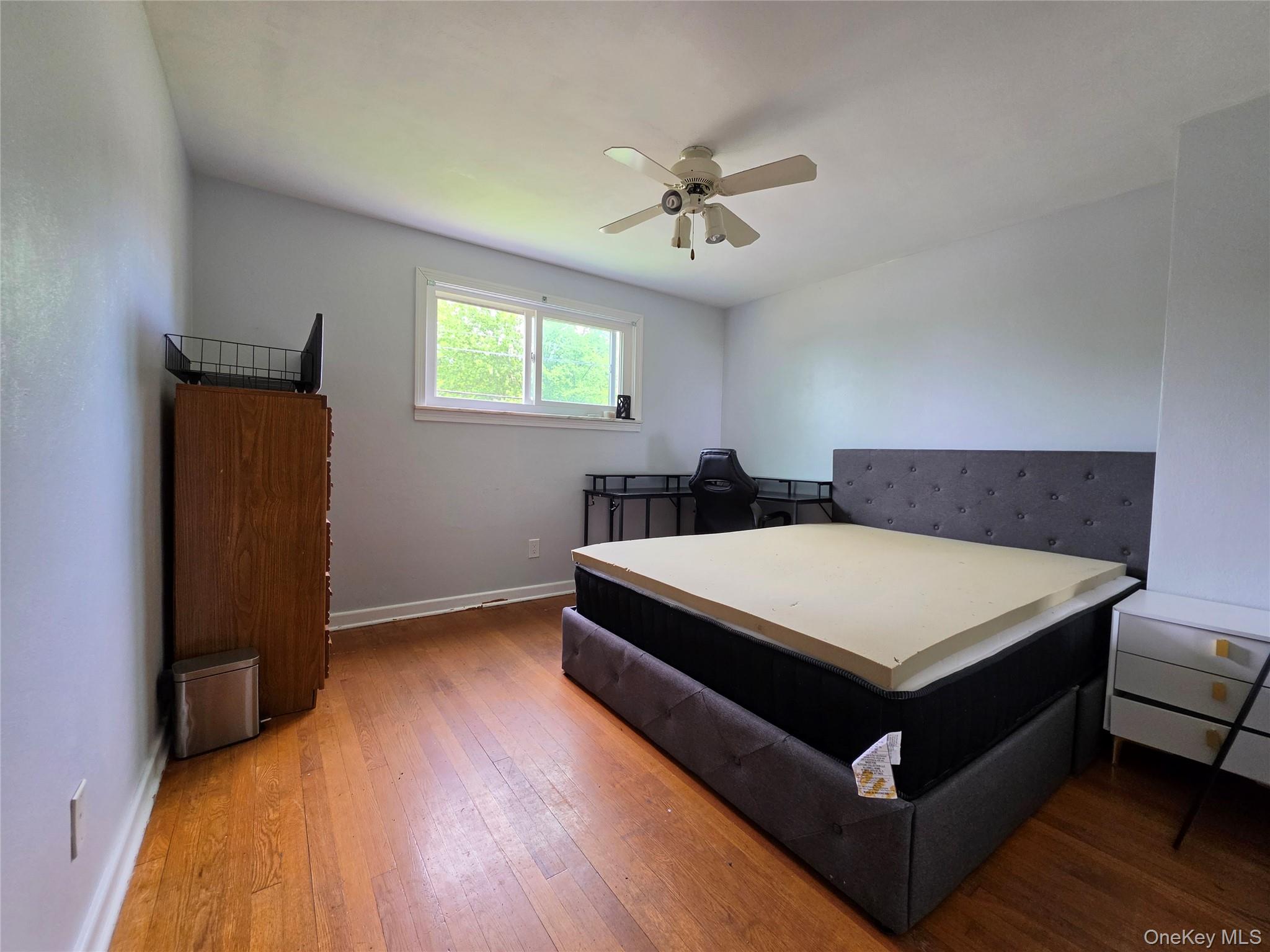 4804 Country Club Road Vestal, NY 13850 - Photo 9 of 15 a bedroom with a bed and a closet