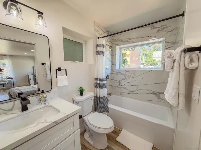 a bed room with a bed and a couch