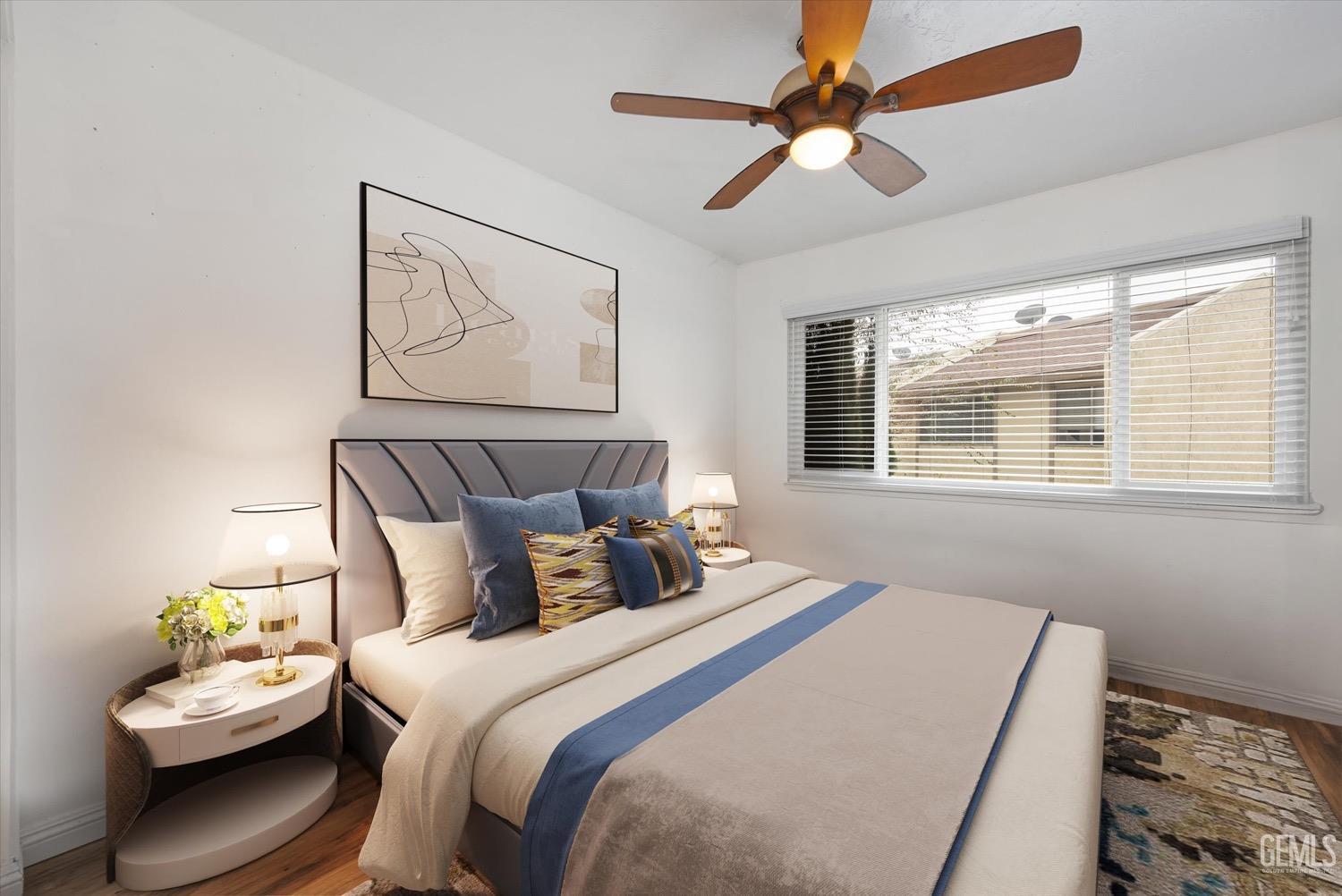 Undisclosed Address Bakersfield, CA 93308 - Photo 11 of 40 a bedroom with bed and a window