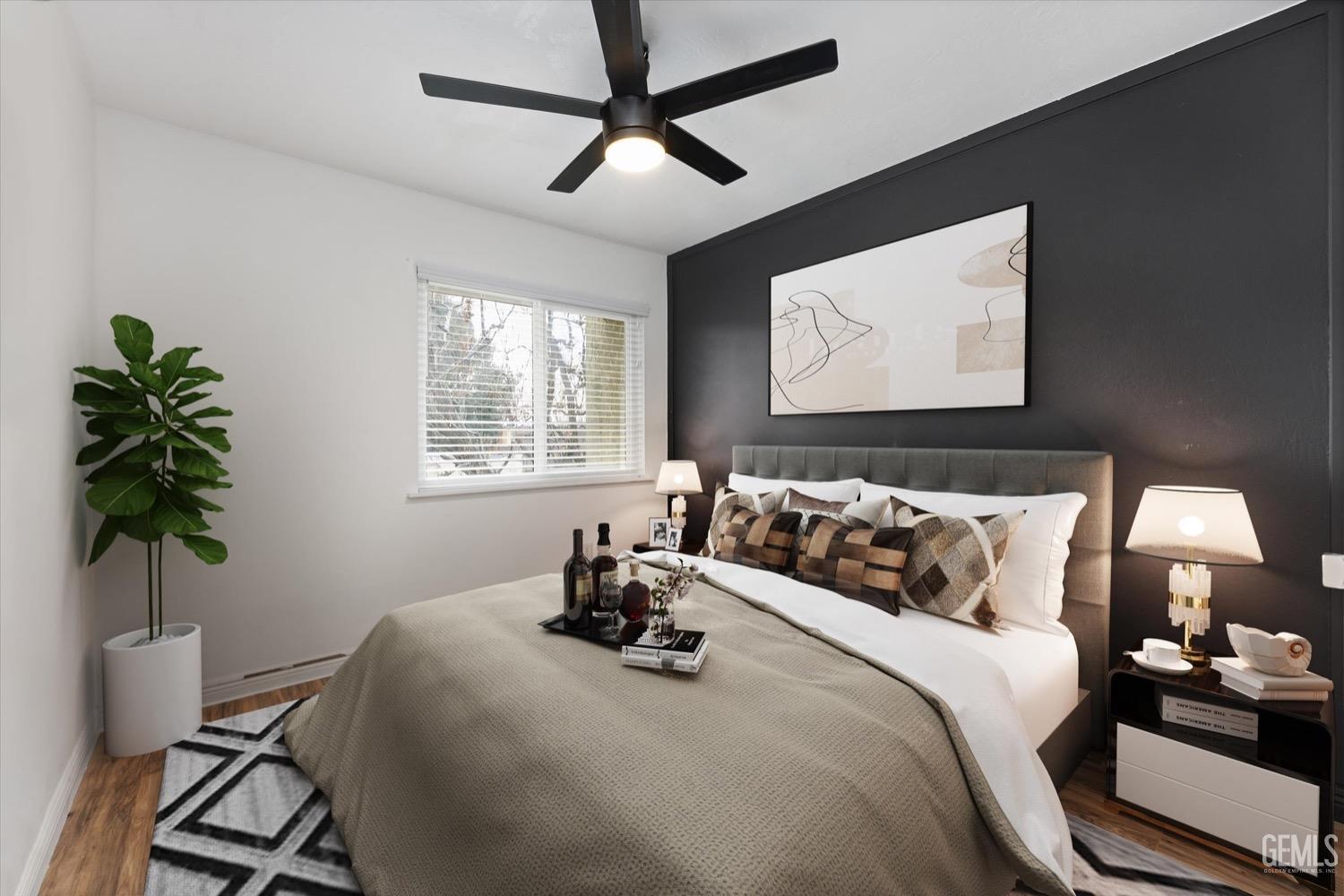 Undisclosed Address Bakersfield, CA 93308 - Photo 13 of 40 a bedroom with bed and window
