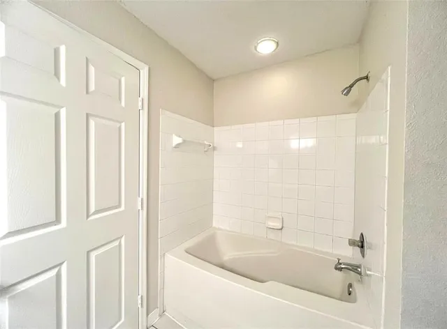 a bathroom with a bathtub