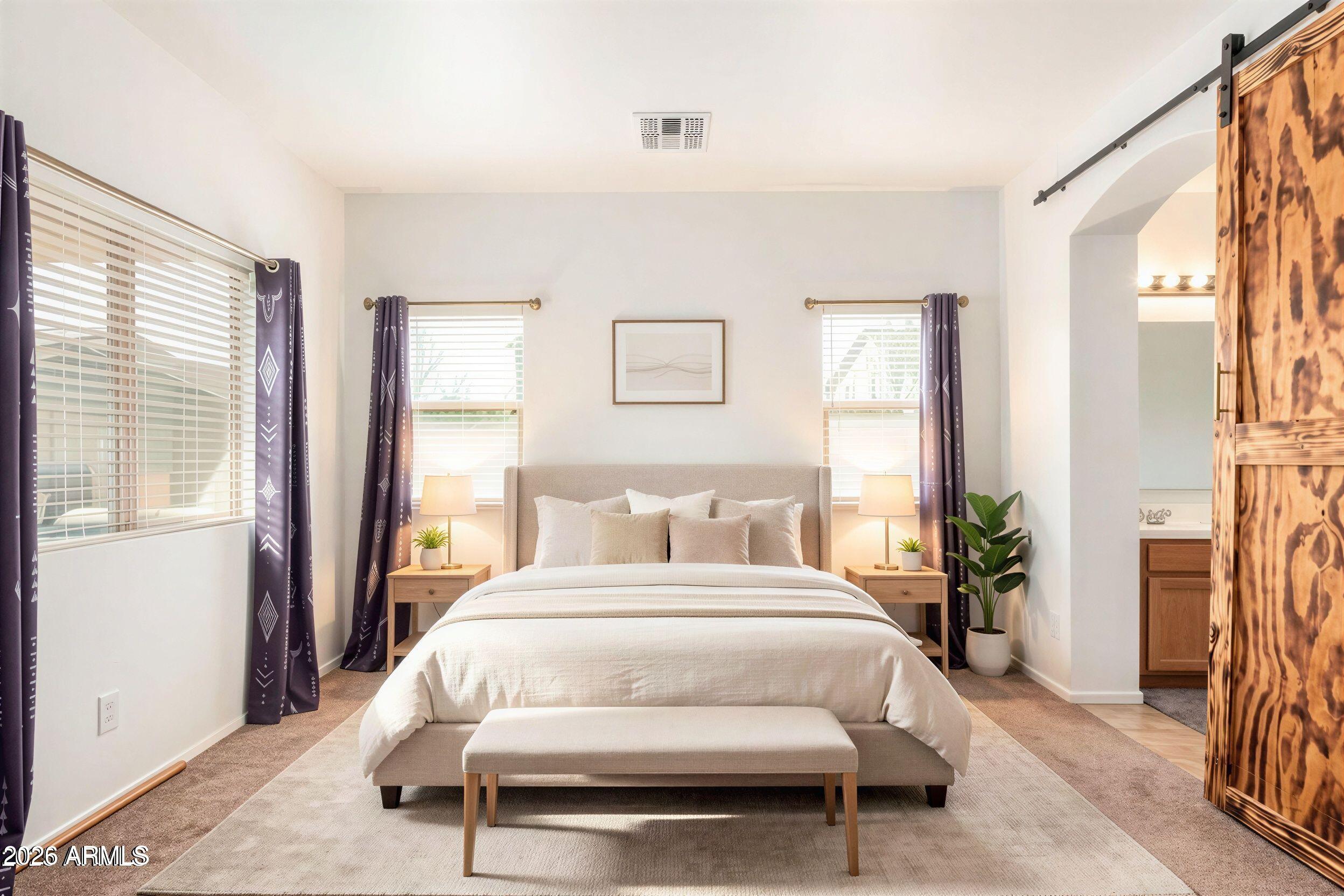 16947 West Cocopah Street Goodyear, AZ 85338 - Photo 1 of 22 a bed room with a bed and a chair
