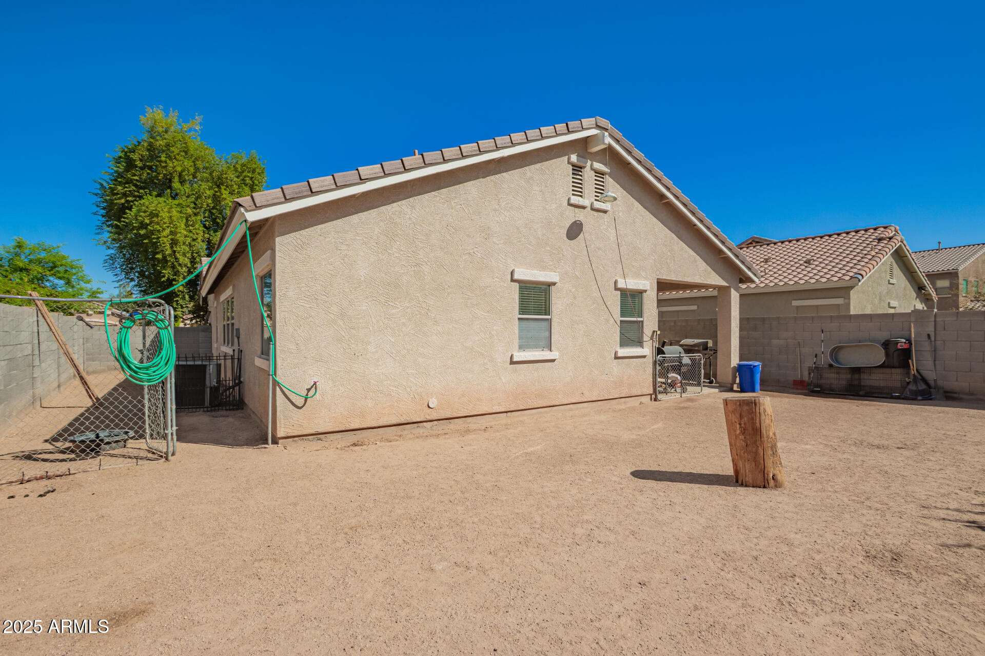 16947 West Cocopah Street Goodyear, AZ 85338 - Photo 21 of 22 a view of a house with backyard