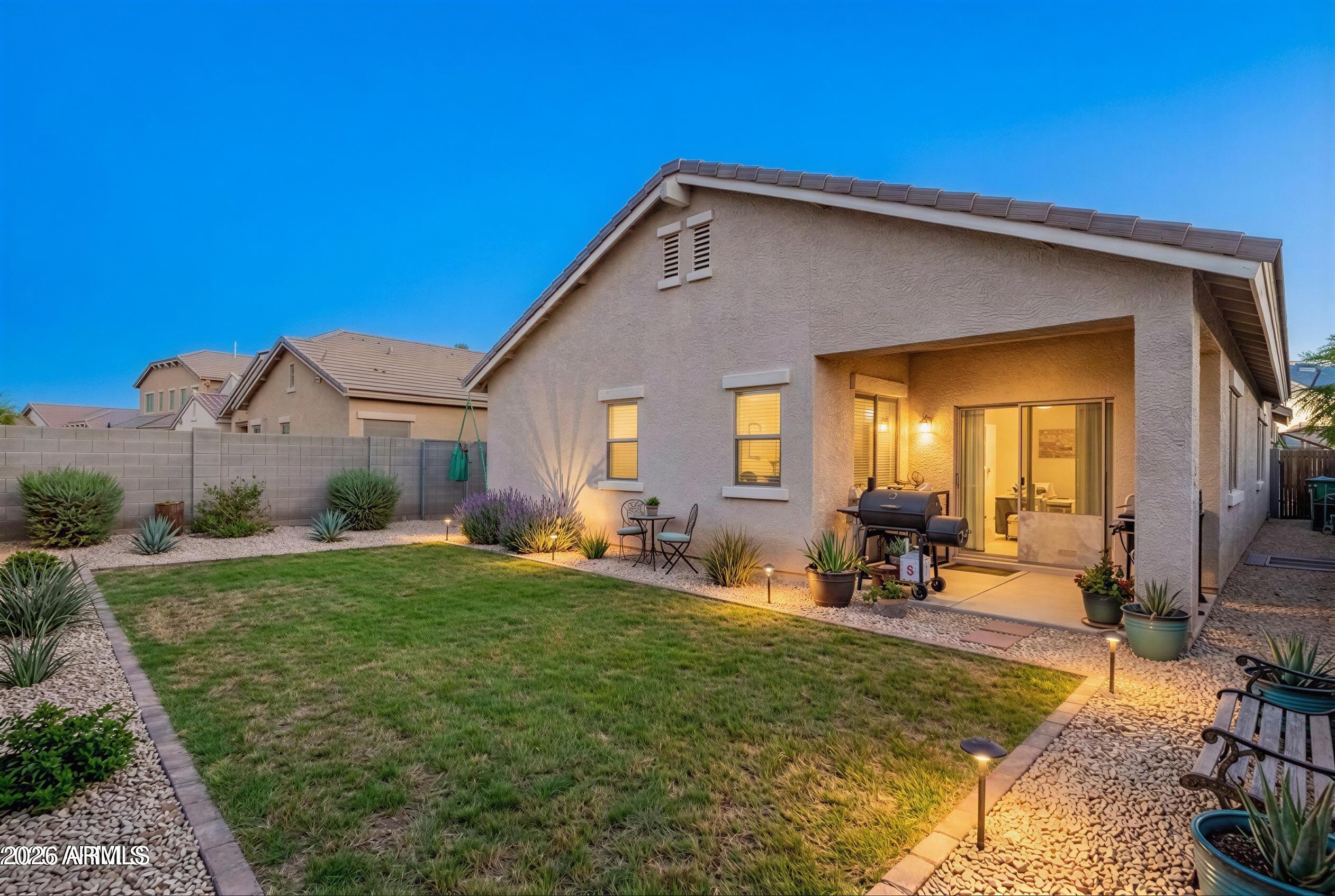 16947 West Cocopah Street Goodyear, AZ 85338 - Photo 6 of 22 a view of a house with backyard and sitting area