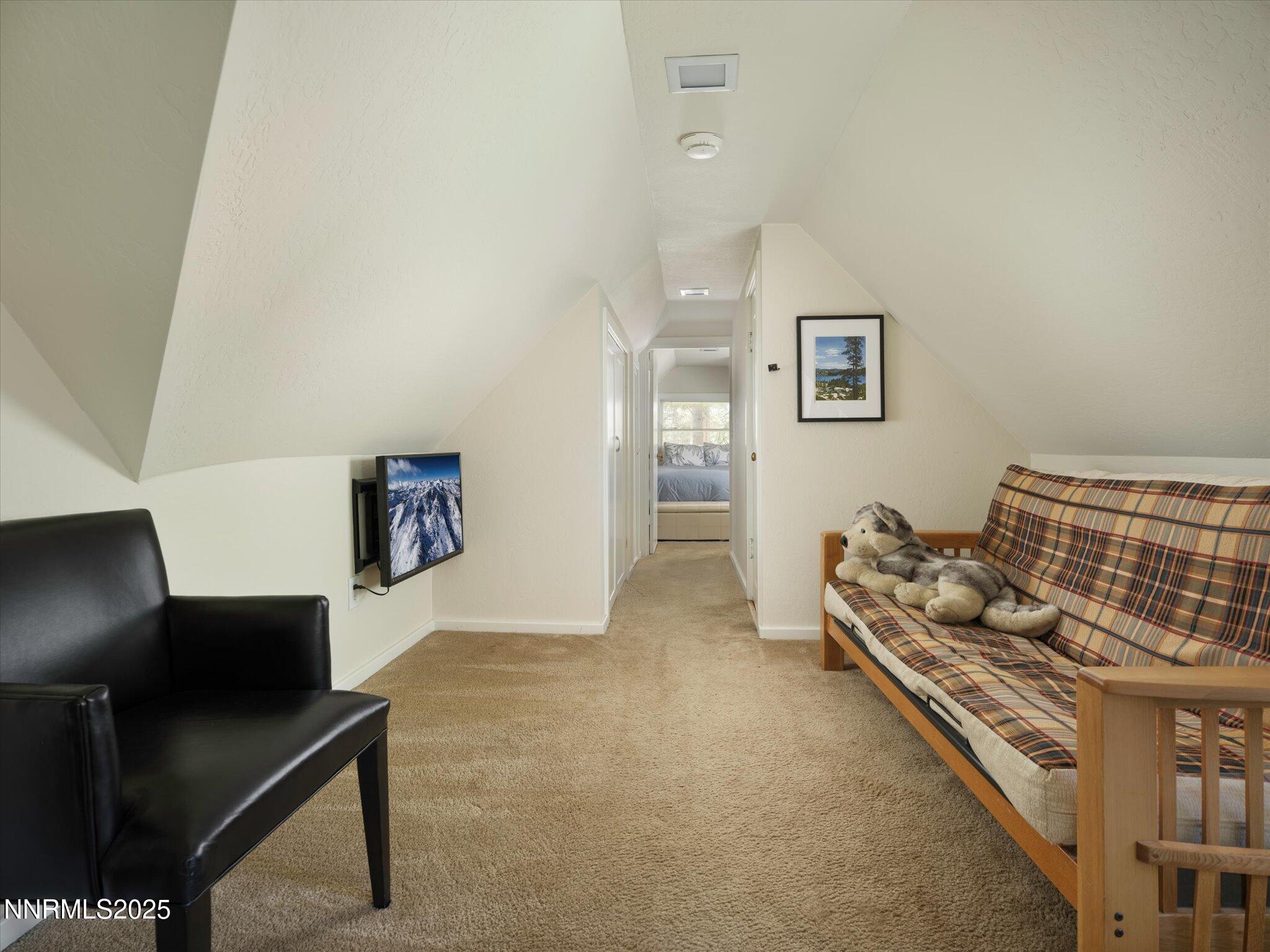 644 Job Lane Zephyr Cove, NV 89448 - Photo 13 of 26 a bedroom with furniture and a air conditioner vent