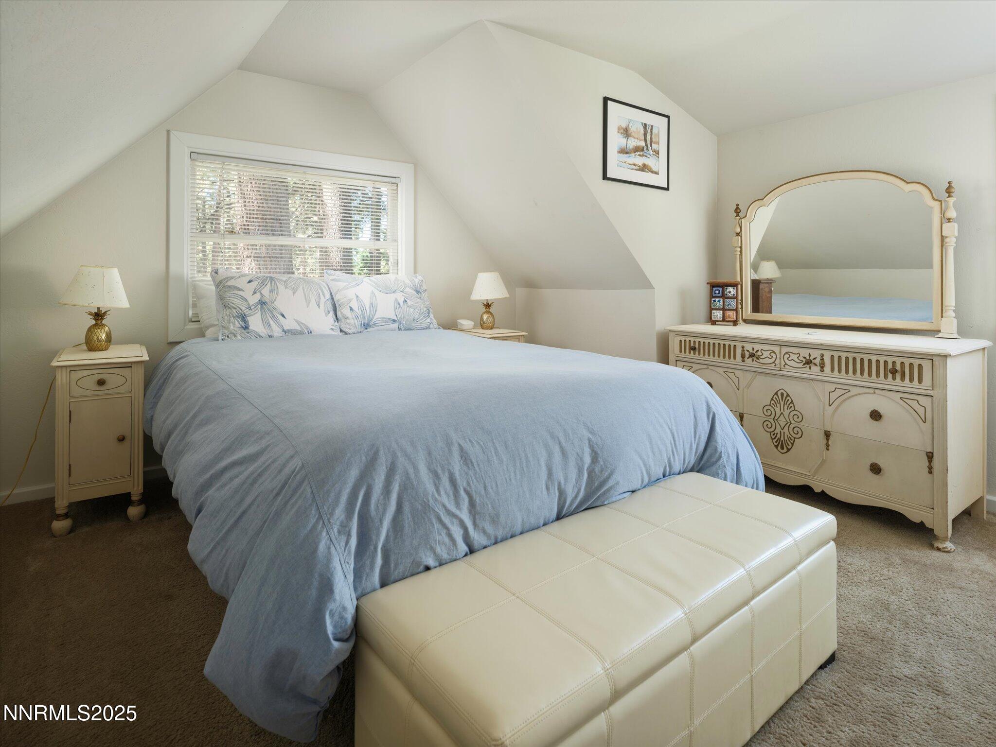 644 Job Lane Zephyr Cove, NV 89448 - Photo 14 of 26 a bedroom with a bed and a dresser