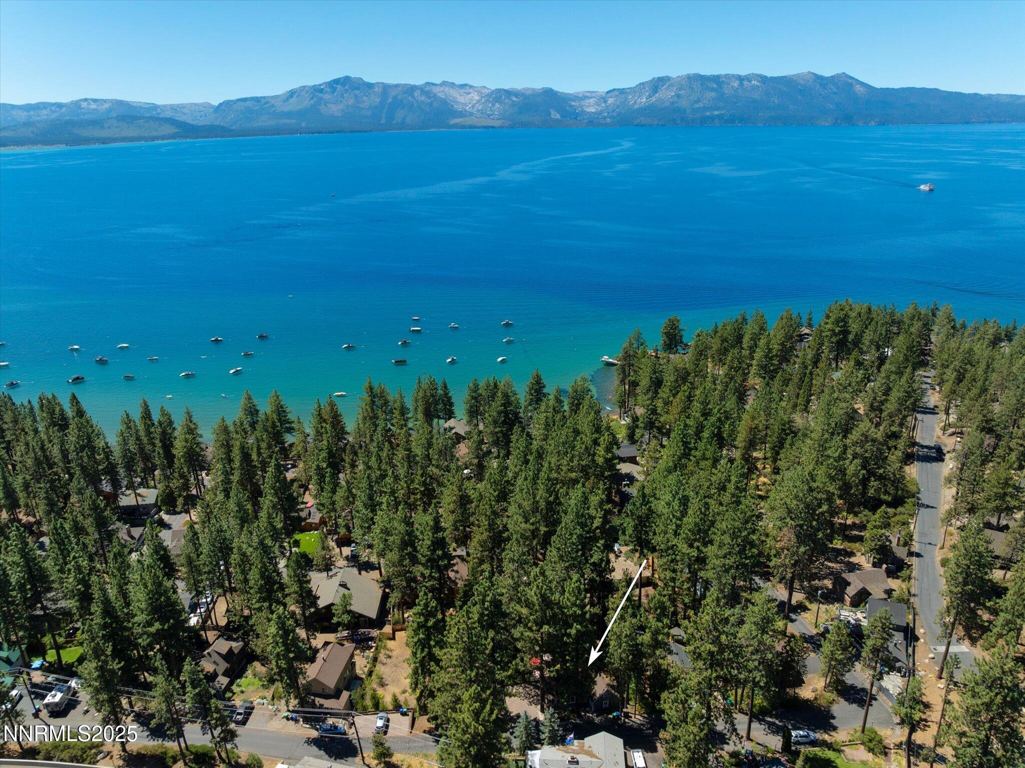 644 Job Lane Zephyr Cove, NV 89448 - Photo 16 of 26 a view of an ocean with a mountain