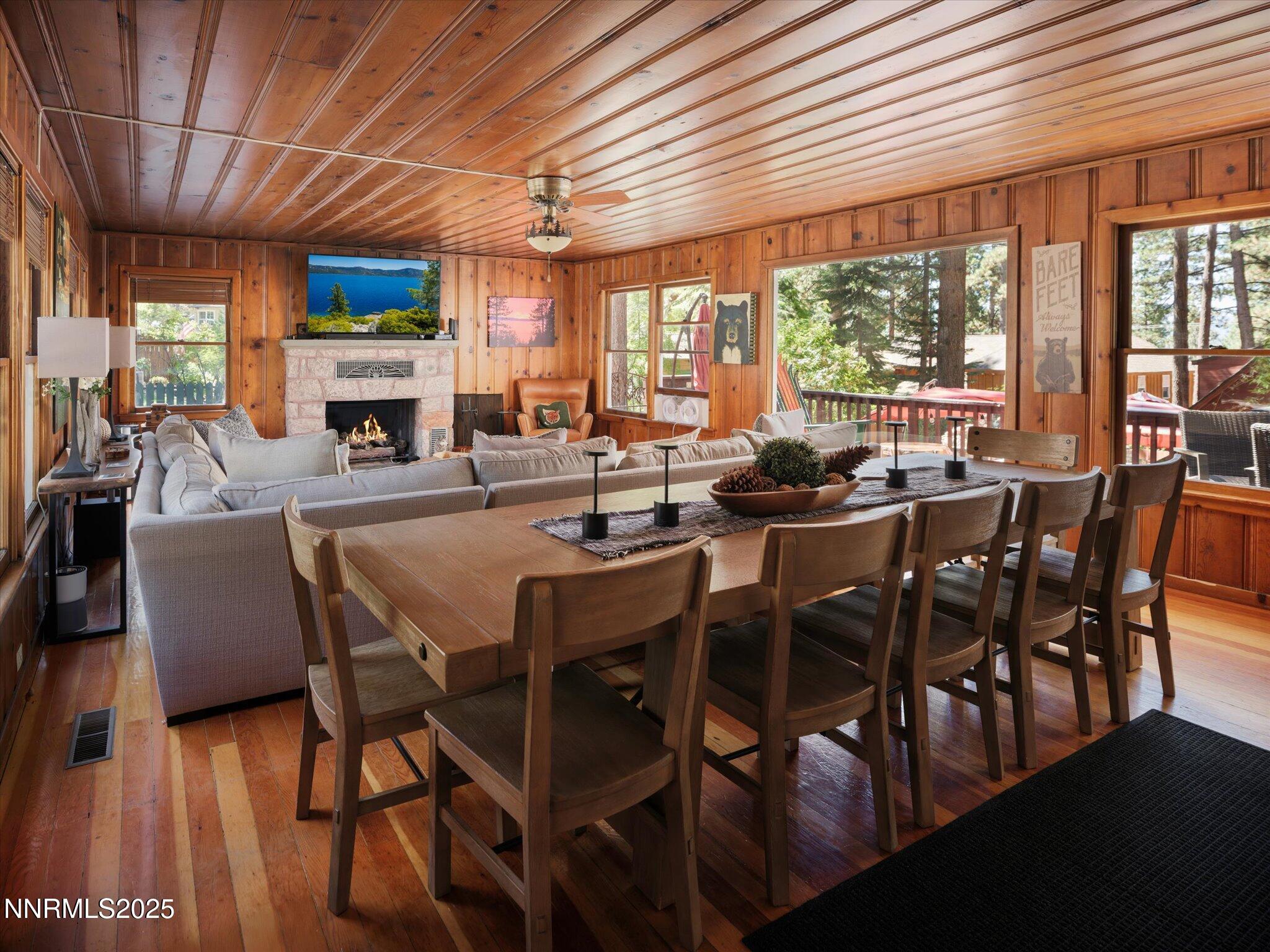 644 Job Lane Zephyr Cove, NV 89448 - Photo 5 of 26 a view of a dining room with furniture window and wooden floor