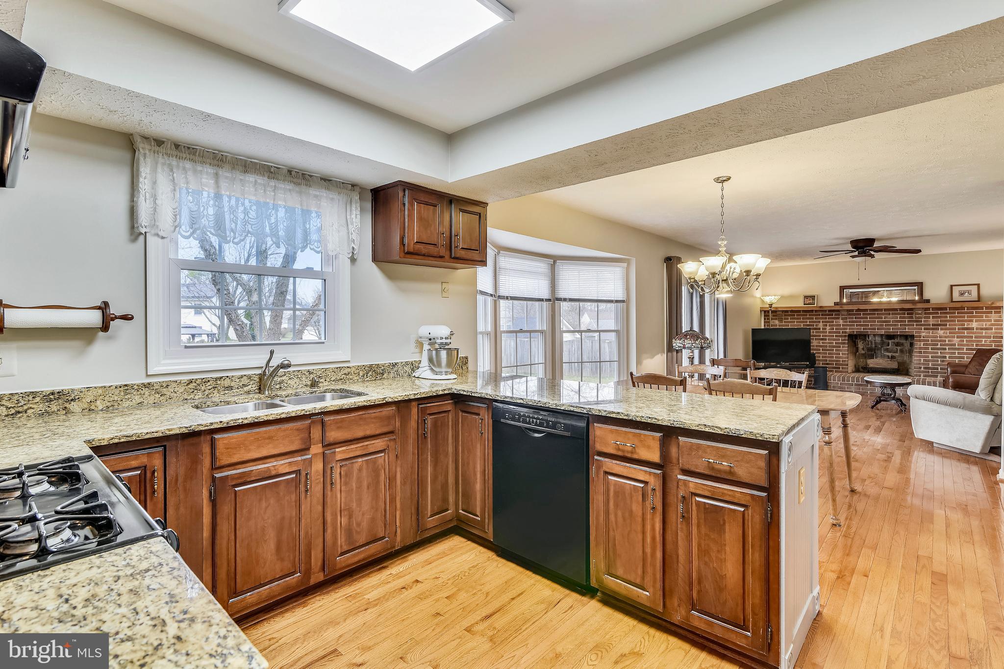 103 Rector Street Sterling, VA 20164 - Photo 5 of 25 Kitchen with cherry cabinets and granite counters