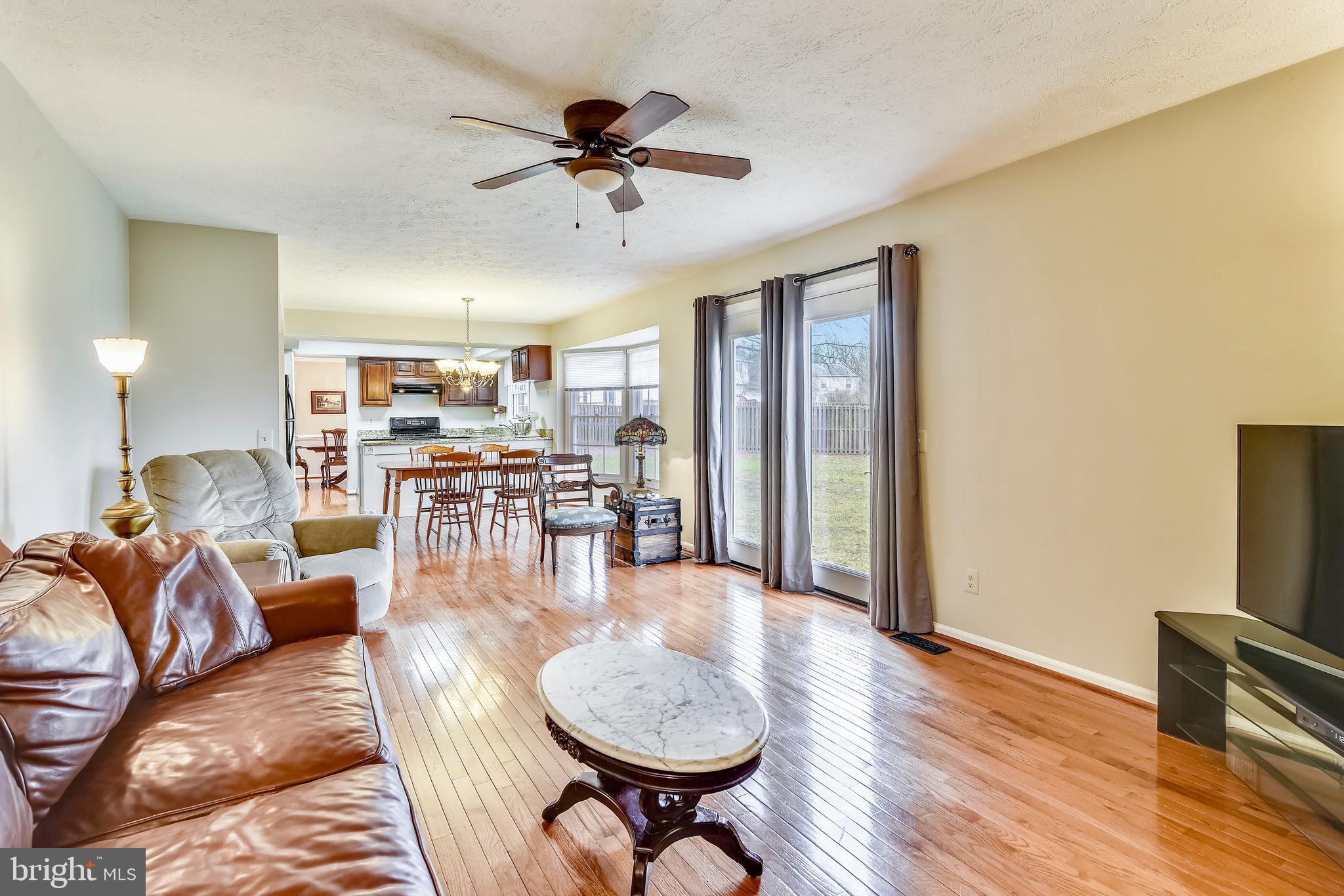 103 Rector Street Sterling, VA 20164 - Photo 9 of 25 Family room with french door to backyard