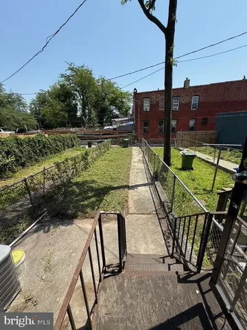 a view of balcony with wooden floor