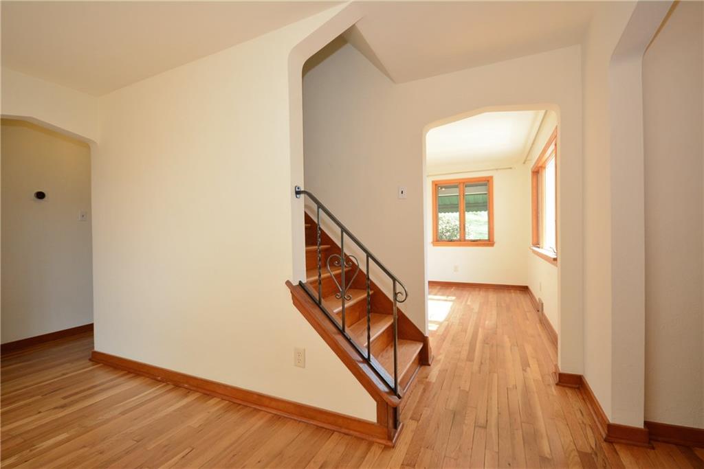 3201 Provost Road Pittsburgh, PA 15227 - Photo 3 of 25 The hardwood floors have just been refinished on both floors and are gorgeous. The rooms are flooded with light from the well sized windows in each room. Here you are looking from the living room to the dining room.