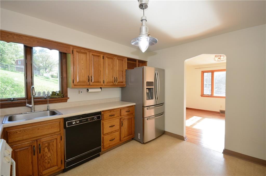 3201 Provost Road Pittsburgh, PA 15227 - Photo 8 of 25 How nice to be able to do the dishes while looking outside! There is also a water filter under the sink that filters the water for the ice cube maker in the refrigerator too.