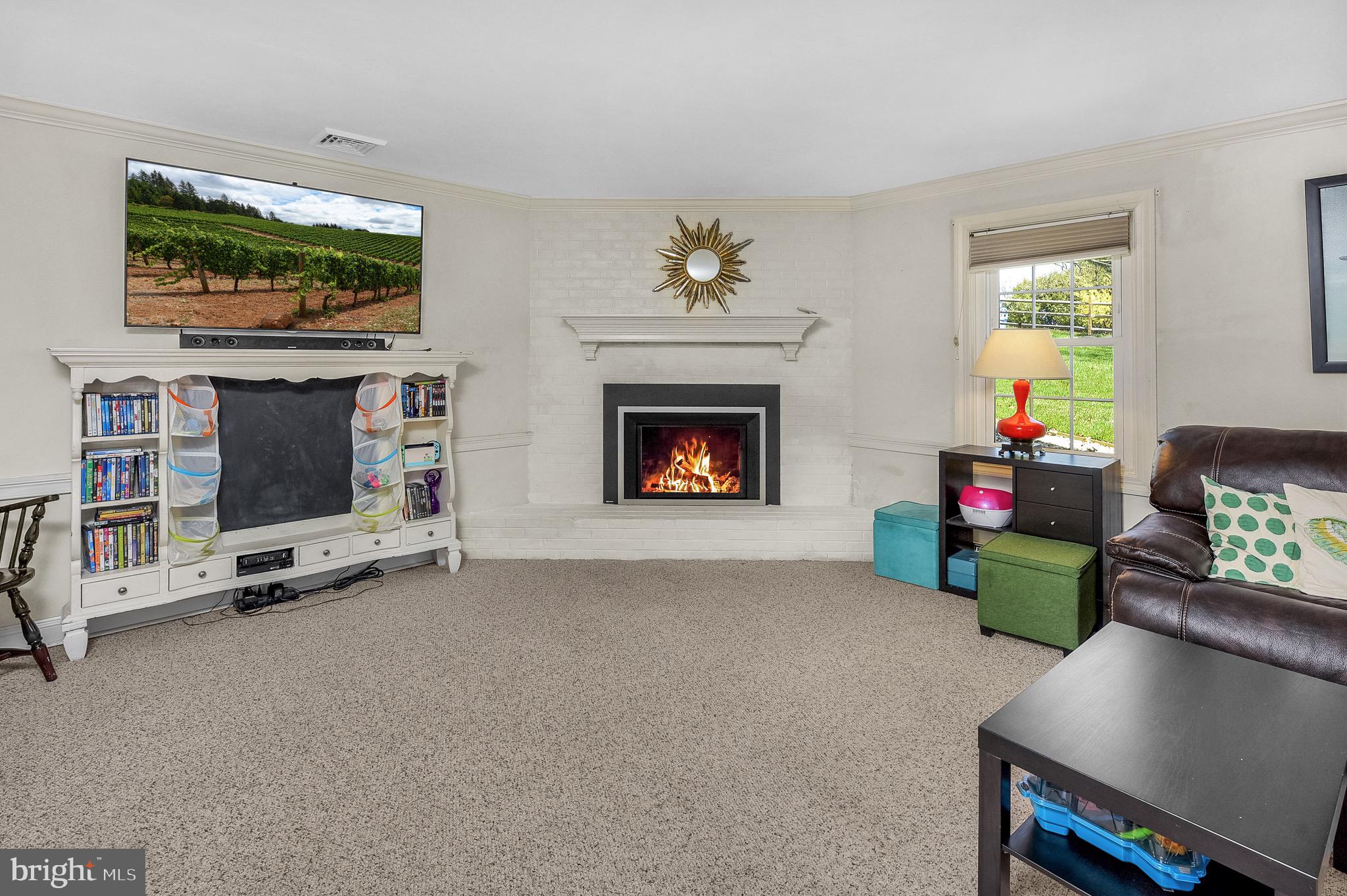 3 Deerpath Road Chalfont, PA 18914 - Photo 13 of 32 Family room with propane fireplace
