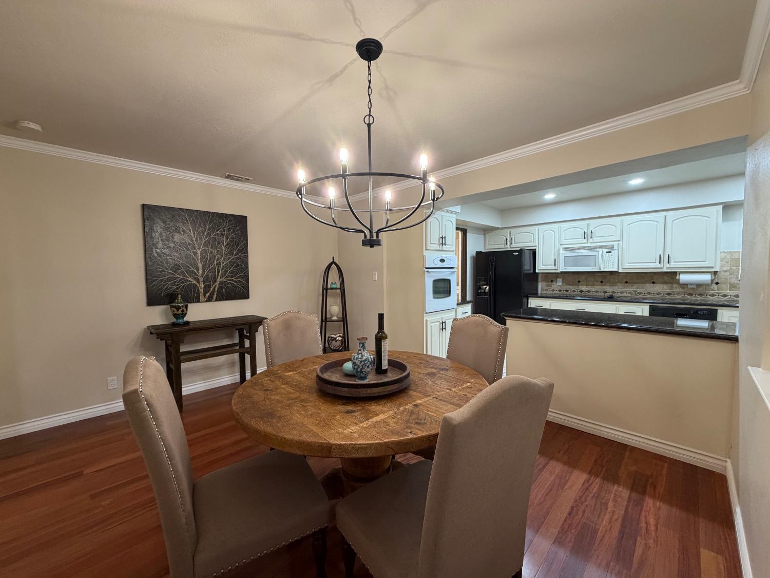 5706 Jeff Way Carmichael, CA 95608 - Photo 14 of 48 Formal Dining room opens up to Kitchen area with updated configuration, lighting, sink, and hardware.