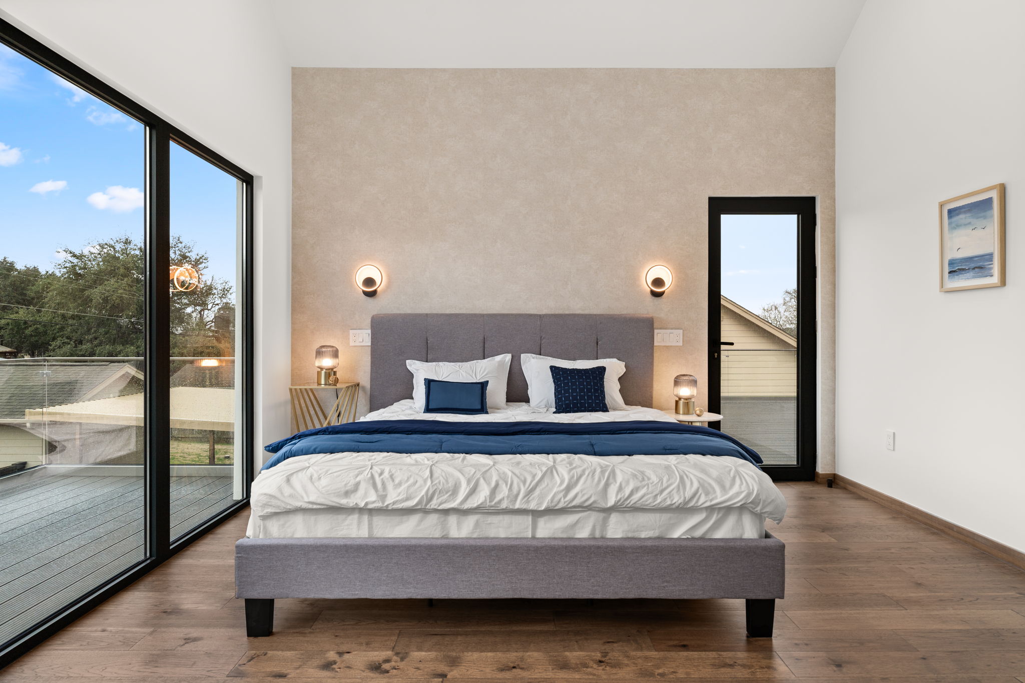 2915 Chisholm Trail Austin, TX 78734 - Photo 21 of 35 a bedroom with a large bed and a large window