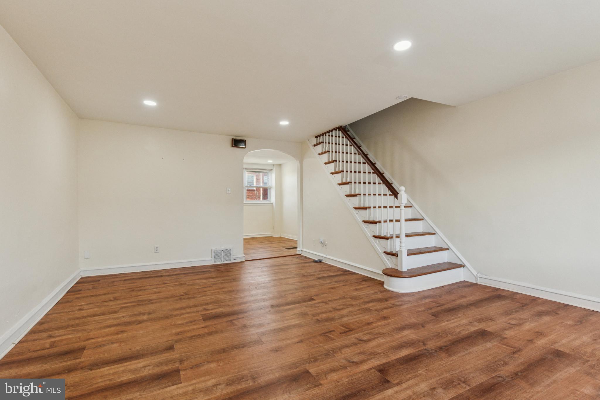 7816 Thouron Avenue Philadelphia, PA 19150 - Photo 3 of 14 Spacious living area with elegant staircase.