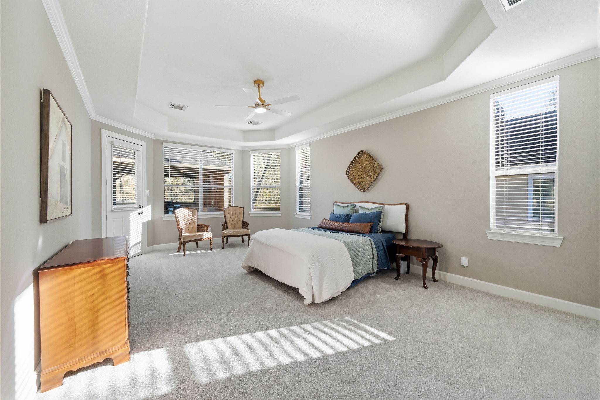 32807 Whitburn Trail Fulshear, TX 77441 - Photo 17 of 39 a bedroom with a bed lamps and window