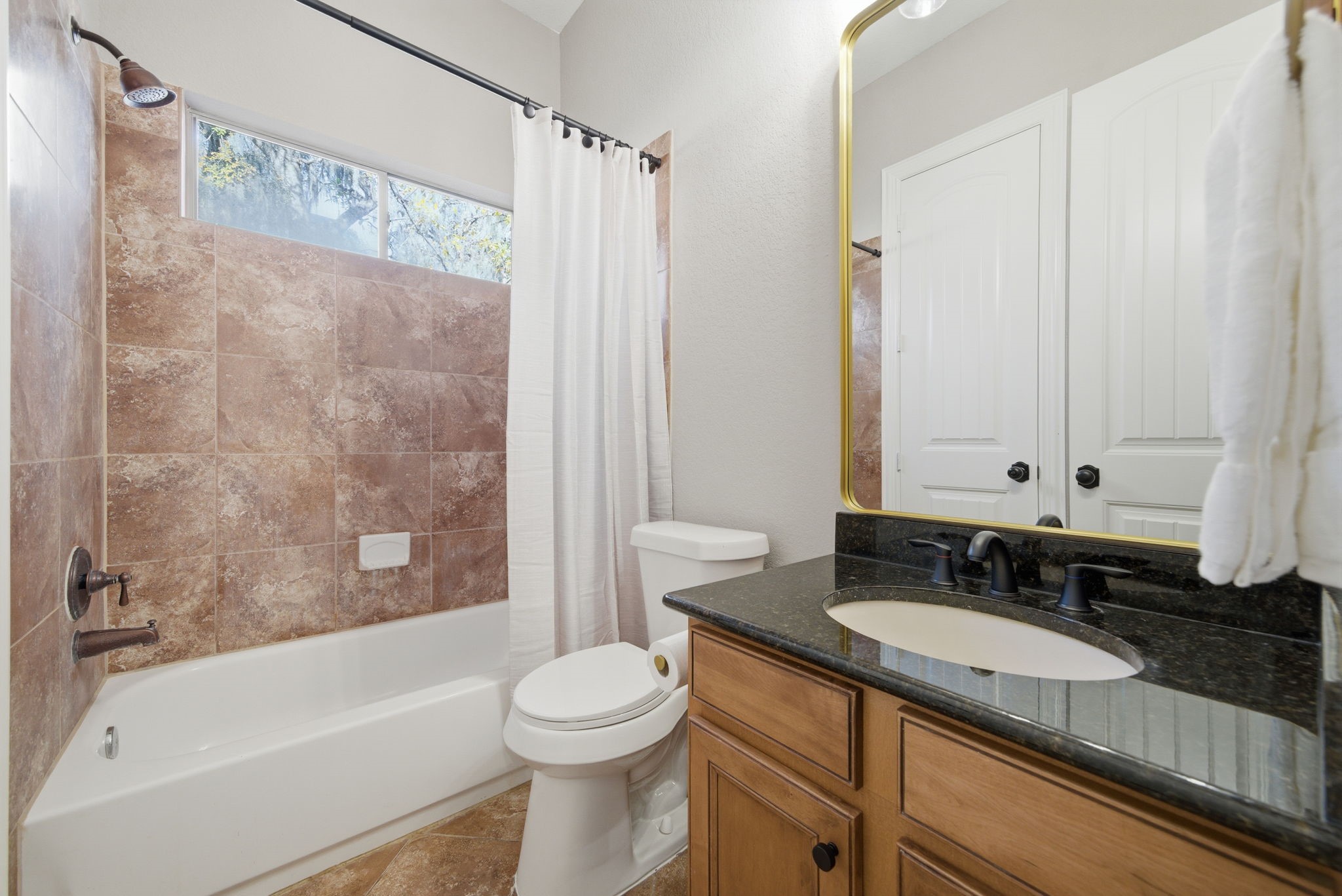 32807 Whitburn Trail Fulshear, TX 77441 - Photo 23 of 39 a bathroom with a granite countertop sink toilet and shower