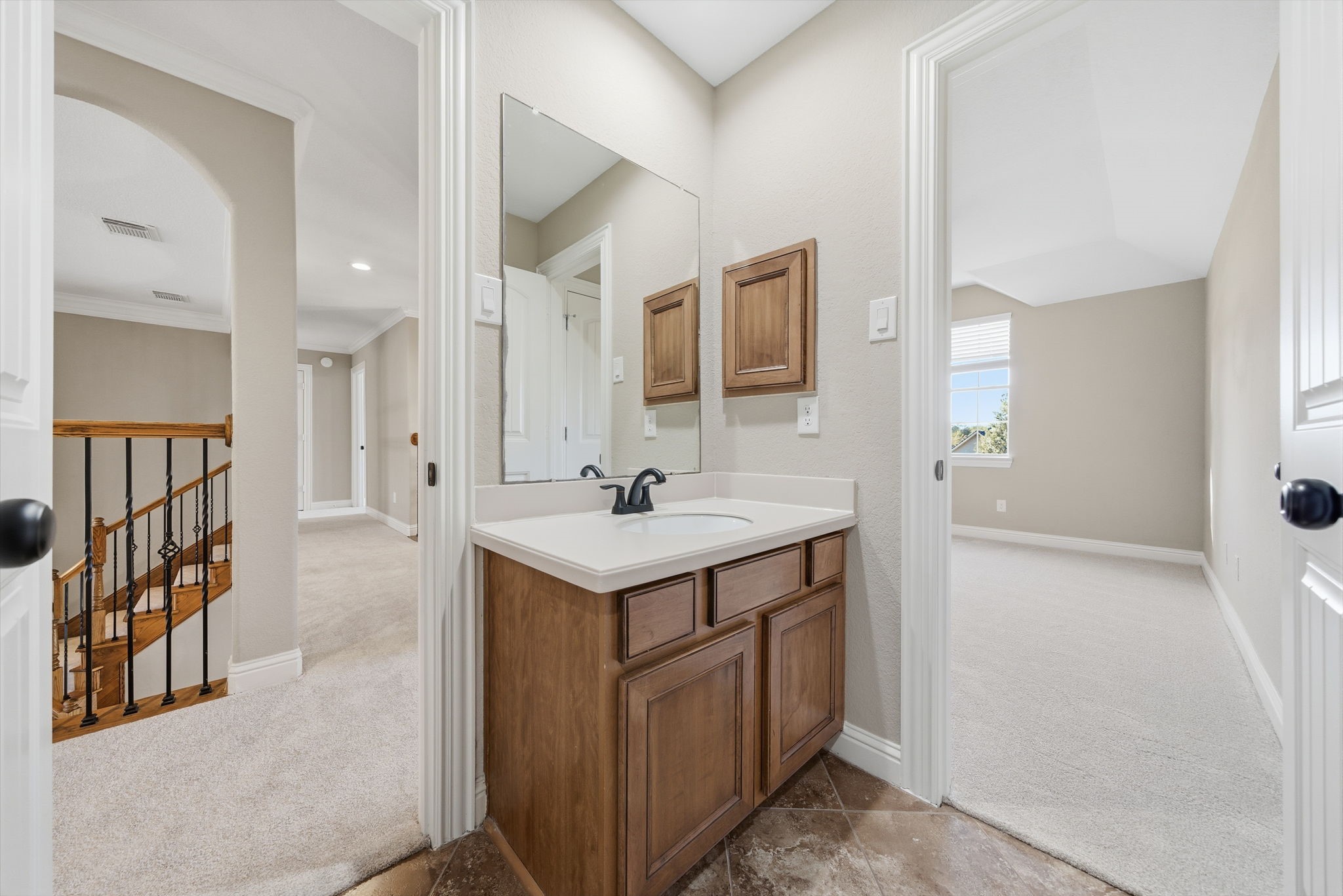32807 Whitburn Trail Fulshear, TX 77441 - Photo 29 of 39 a bathroom with a sink a mirror and a shower