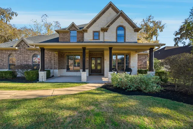 a view of a big yard with a swimming pool