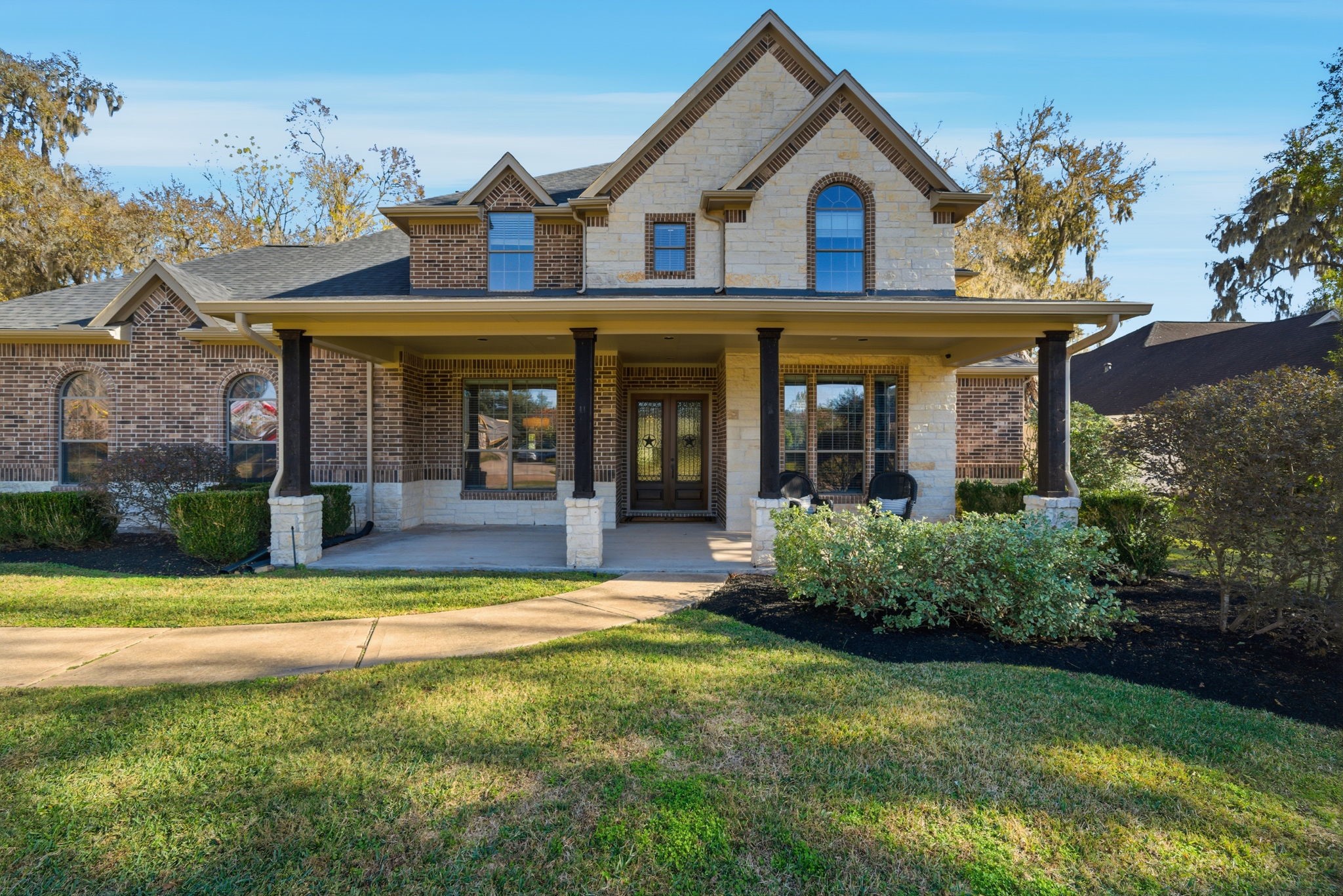 32807 Whitburn Trail Fulshear, TX 77441 - Photo 2 of 39 a view of a house with swimming pool and a garden