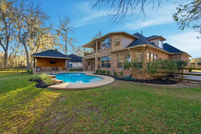 a view of a house with a big yard